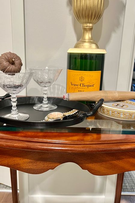 Subtlety spooky👻 feat. The $5.00 snake tray 🐍🖤from Target Dollar Section and the faux cigar. My Veuve candle from Story NYC one of my all time favs 🥂

#LTKSeasonal #LTKhome #LTKHalloween