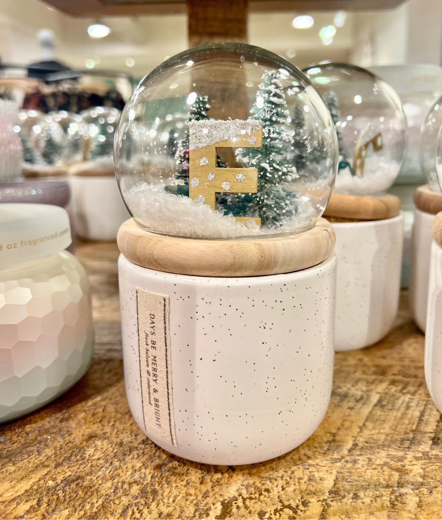 Monogram Snow Globe Woody Fresh Balsam & Cedarwood Ceramic Candle at Anthropologie 

#LTKSeasonal #LTKHoliday #LTKGiftGuide
