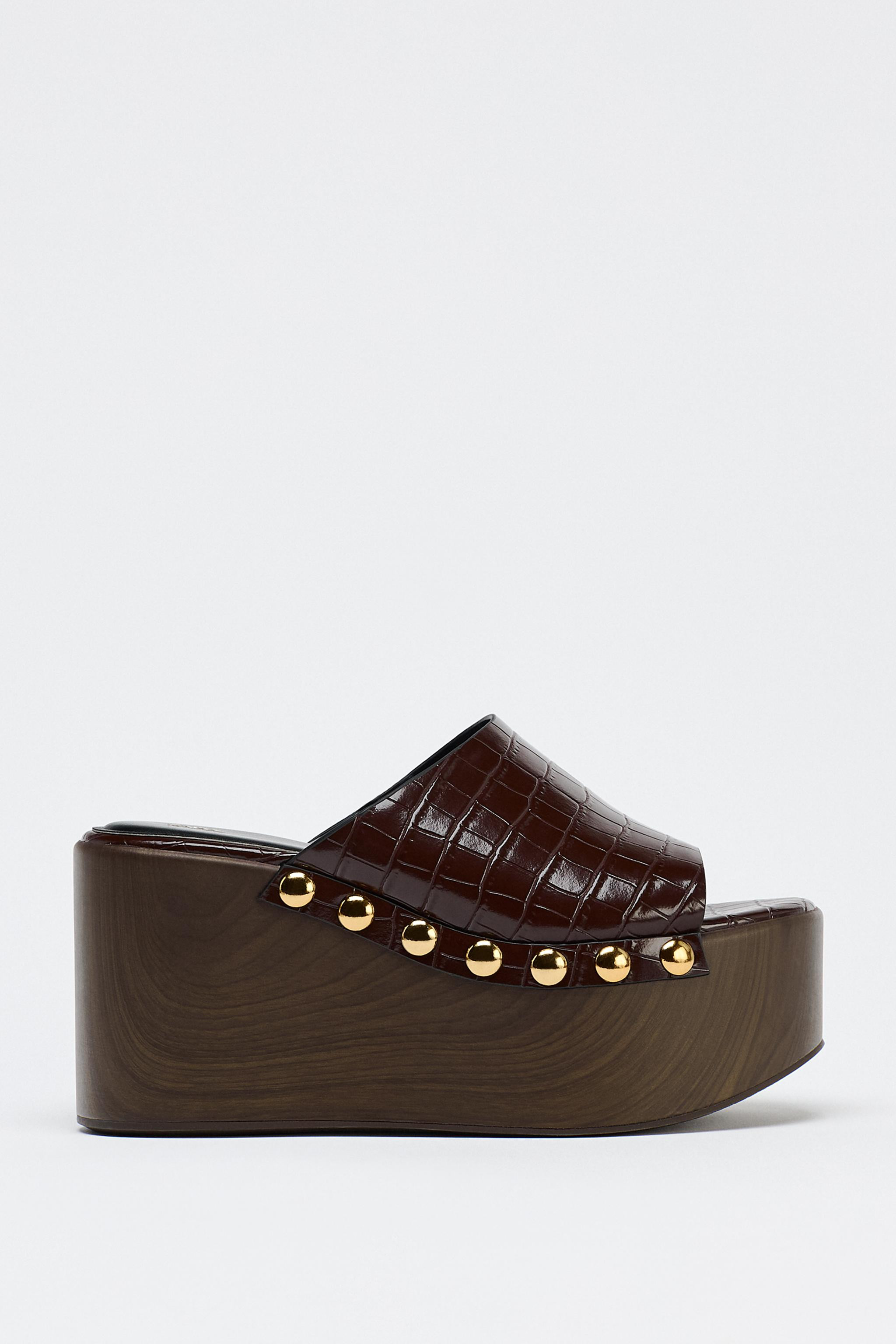 Embossed wedge heel mules. Studded detail on the sides. Platform sole. Round toe.Wedge height: 3.... | Zara US