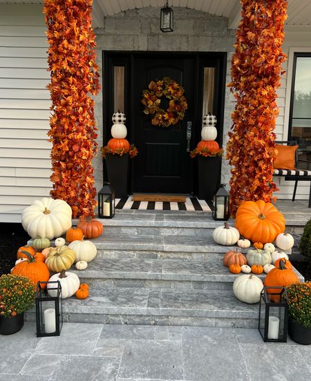 Fall porch decor!! Love this leaf garland that’s on sale - I used 12 strands to pull this off! 

#LTKSeasonal