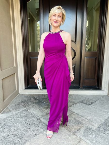 Looking for a no-frump Mother of the Bride Dress to dazzle? I love this gorgeous, purple gown with the gorgeous halter style neckline!  This glamorous dress is super figure flattering and the elegant jewel neckline means all you need is a pair of earrings and a pretty bracelet and you're all set.

#LTKwedding #LTKSeasonal