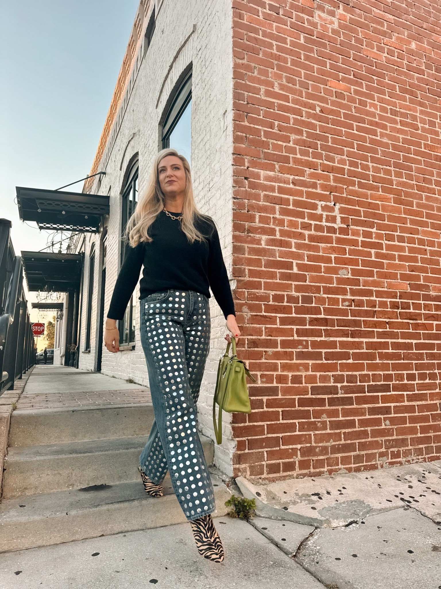 I call these my coin jeans and the people love ‘em. Black cashmere sweater and some funky cowhide tiger boots this was a fun easy look. #cashmere #sweater #embellishedjeans #animalprint  

#LTKootd #LTKTall #LTKmomlife