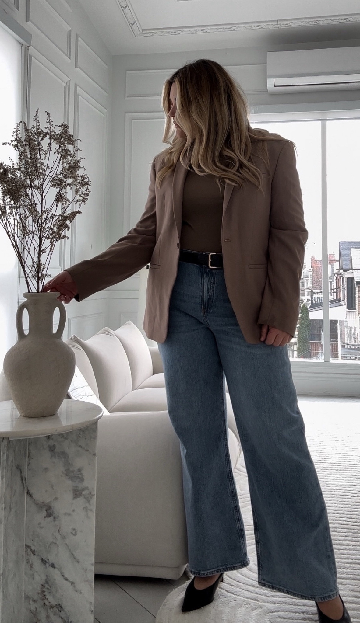 Business casual outfit with a flare. 

This neutral outfit with wide leg jeans and a taupe brown blazer and black mules. 



#LTKmidsize #LTKworkwear #LTKcurves