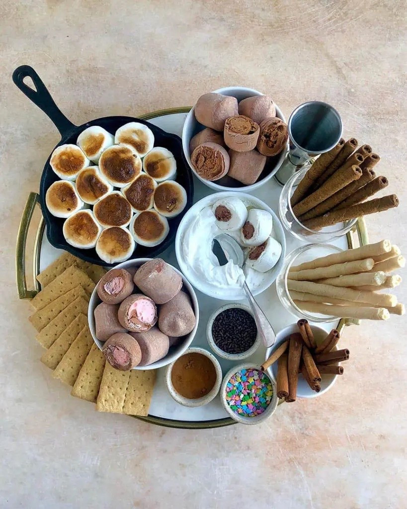 My Hot Chocolate Board was such a hit, that I decided the only way to top it was by adding some booze to make them for some adult fun. I gathered three of my favorite spiked hot chocolate recipes, which you will find below, and built this board and all the toppings around them! Plus, who doesn’t love fluffy marshmallows? My go-to is Stuffed Puffs for adding extra richness and flavor.

#LTKGiftGuide #LTKHoliday