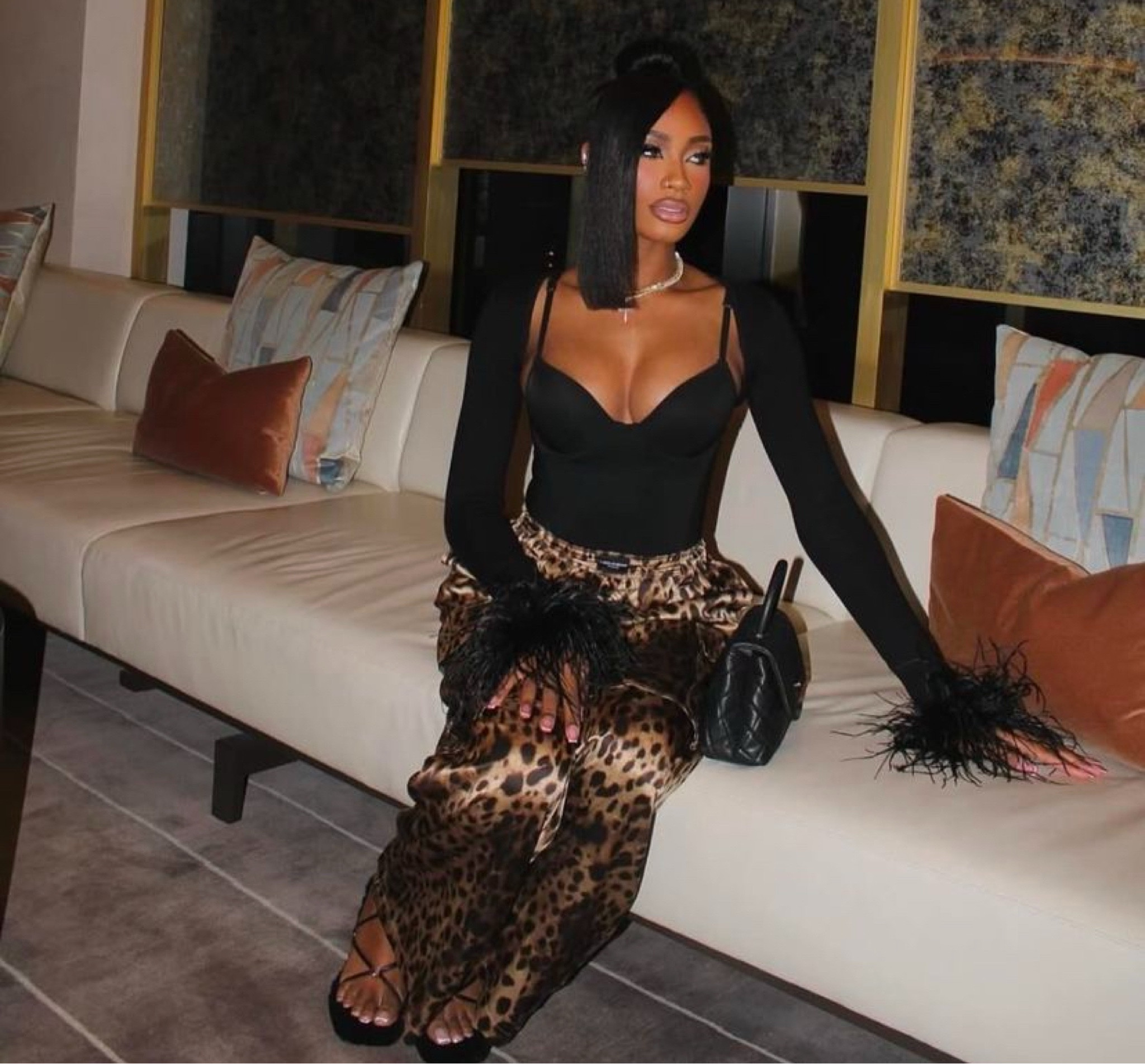 Black sweat heart top 
Black bolero with fur
Black sweater with fur 
Leopard silk pants
Black cross cross heel sandal 
Black quilted Chanel bag 

#LTKPetite #LTKMostLoved #LTKStyleTip