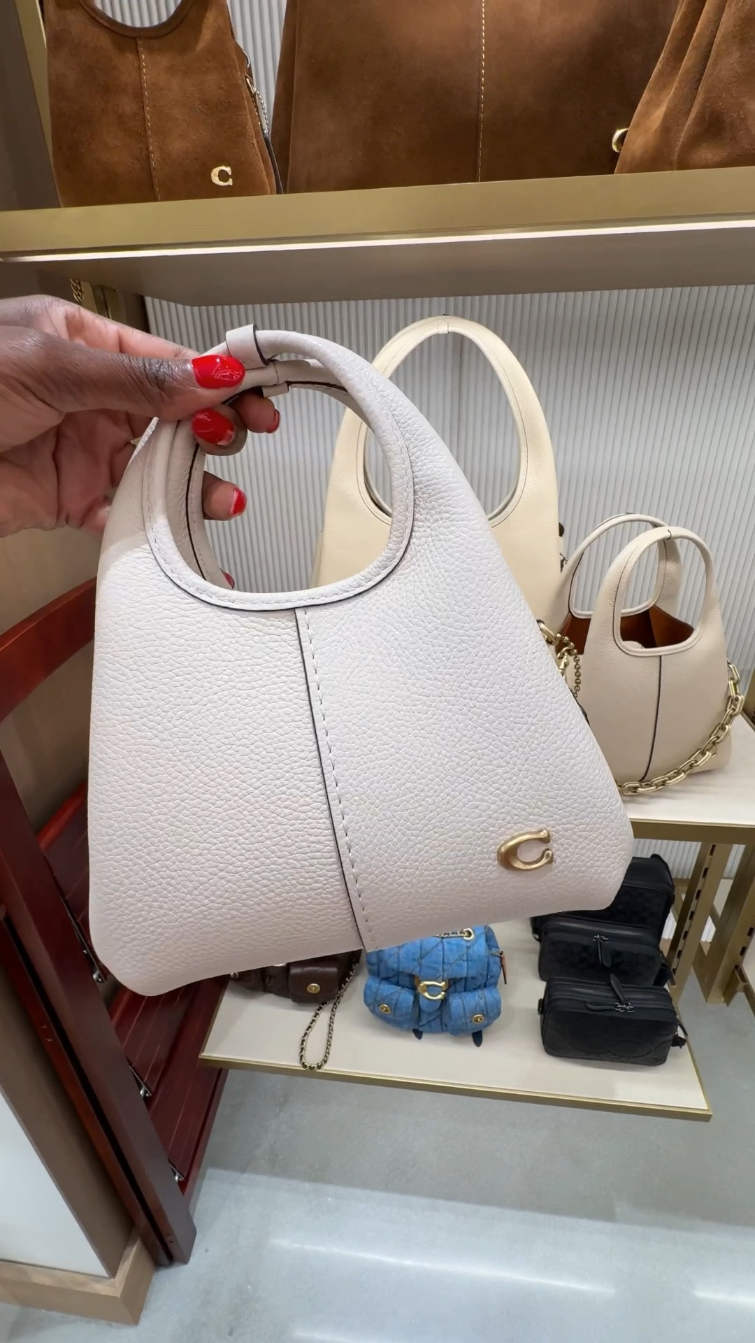 Shopping at Coach 
Will be doing an unboxing on my YouTube channel in the coming days. 

#Ootd #LTKOver40 

#LTKstorytime #LTKdayinmylife #LTKSeasonal