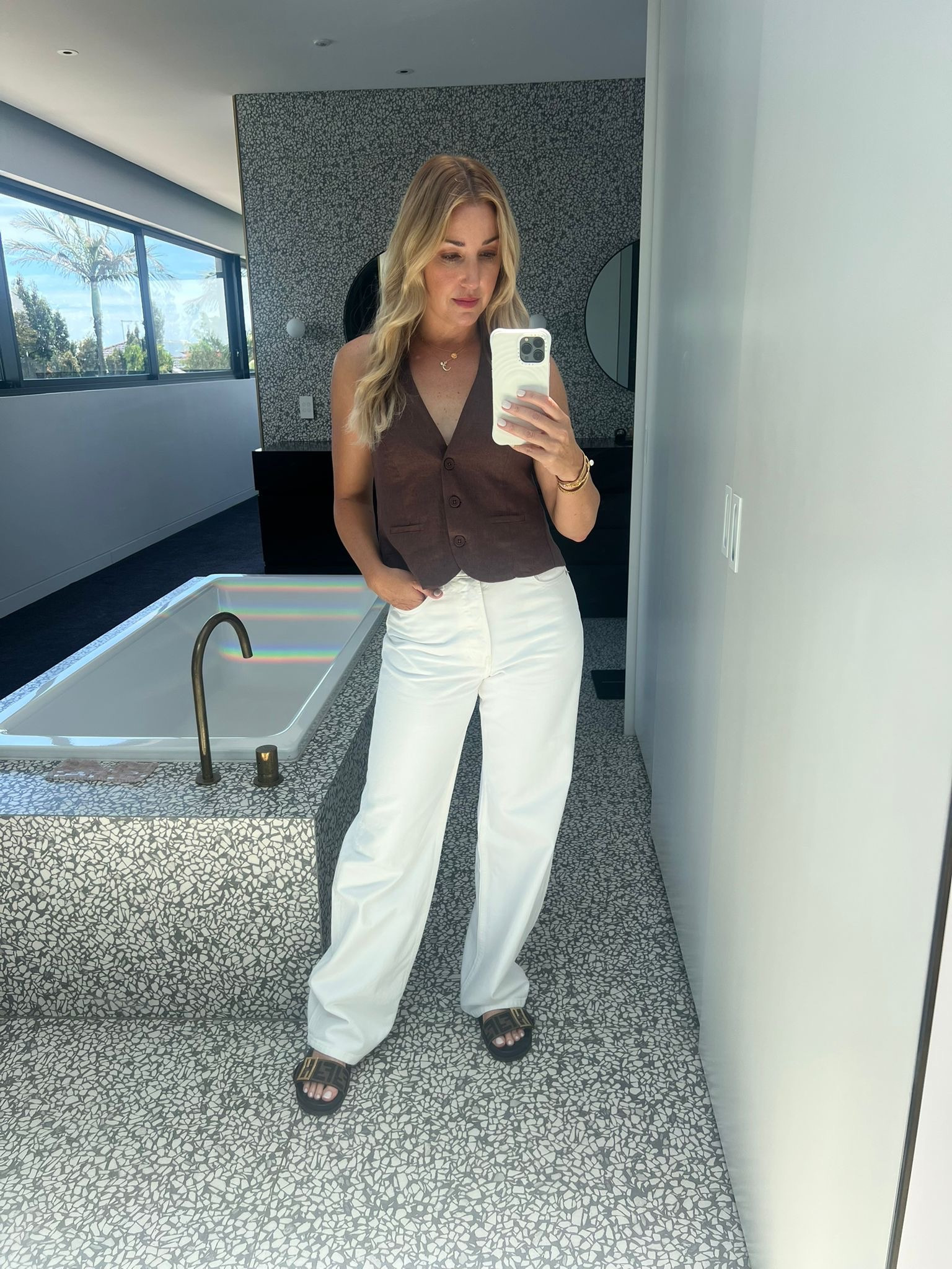 Brown vest paired with white denim for the perfect summer look!

#LTKsummer #LTKaustralia