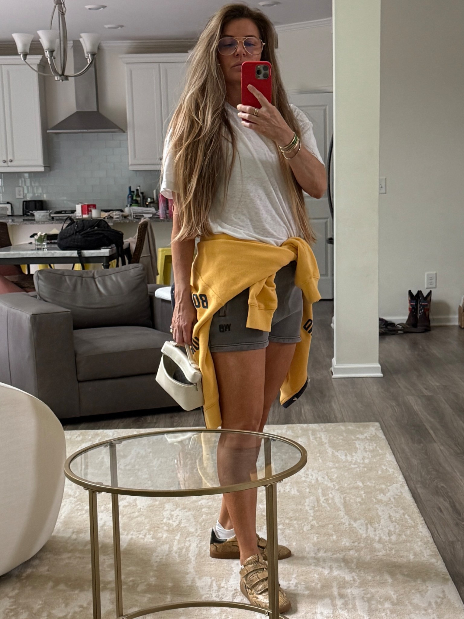 Rainy day comfy. This tee runs oversized. Choose your normal size for the look, or size down for a slimmer fit. I’m wearing medium  

#LTKStyleTip #LTKOver40 #LTKSummerEdit