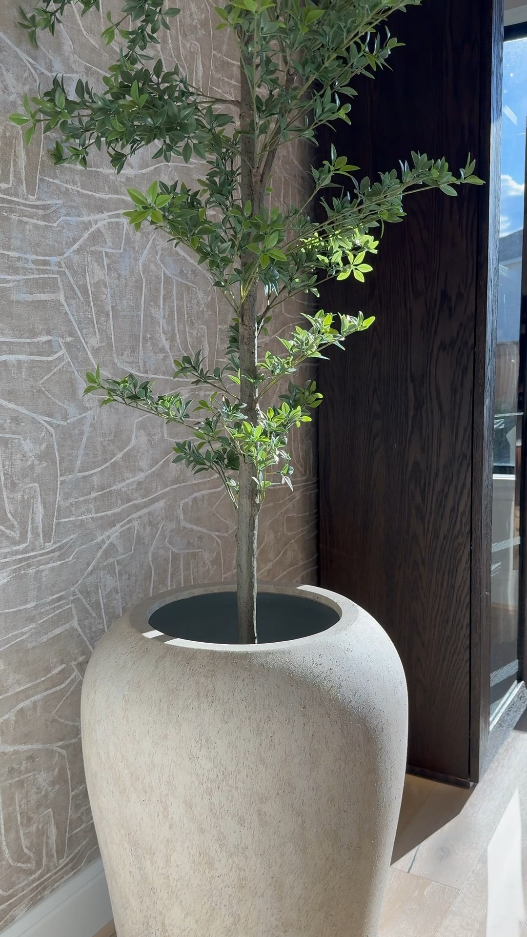 I am absolutely loving this planter from Pottery Barn! It's gorgeous, and the best part is that it's so versatile - it works perfectly for both bigger trees and smaller ones too! 🌳 I love it so much that I actually ended up buying another one, haha! 😆 It's definitely a game-changer for decorating any space. 

#LTKHome #LTKStyleTip #LTKSaleAlert