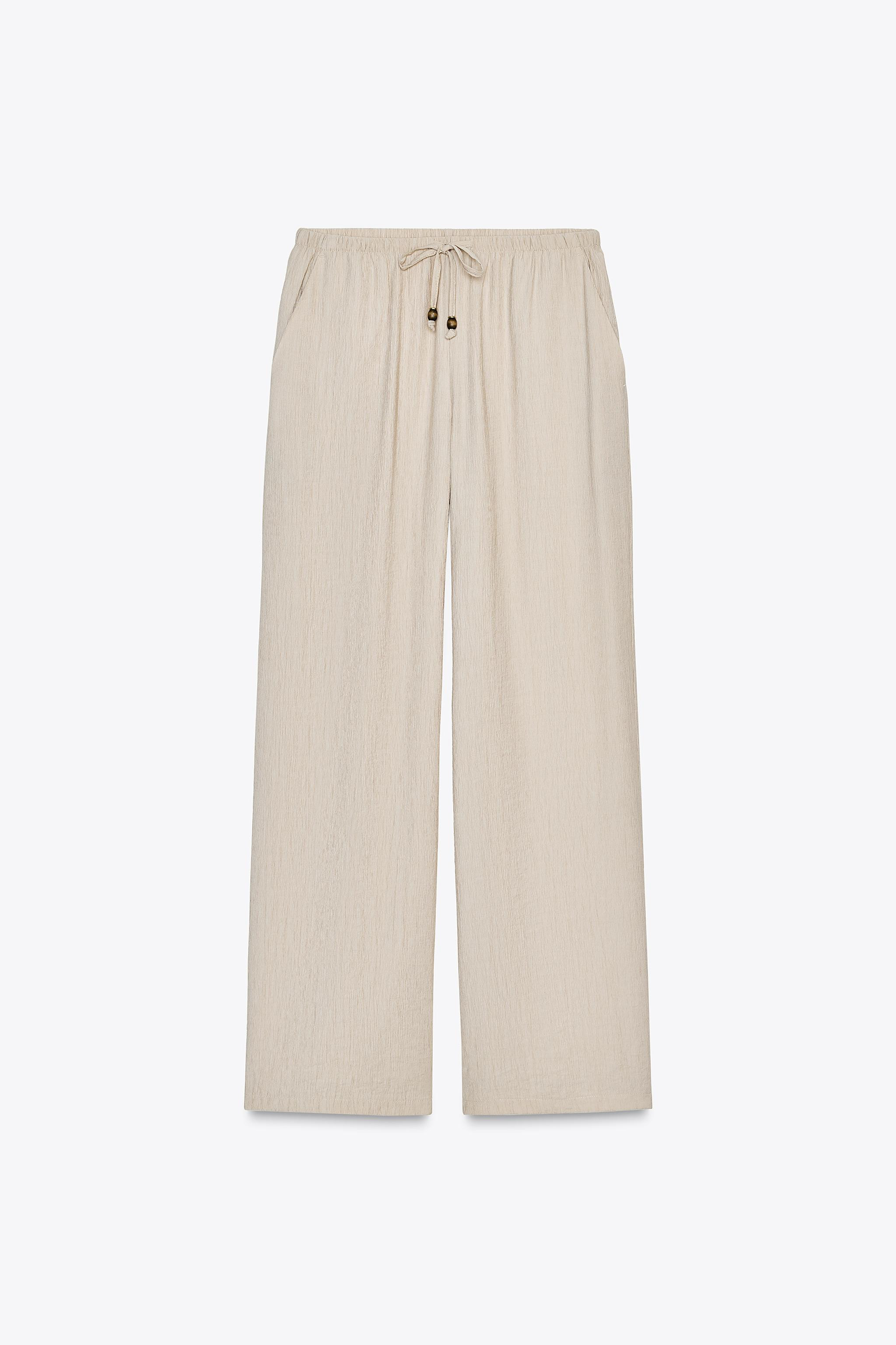 WIDE-LEG TROUSERS WITH ELASTIC WAISTBAND | Zara UK