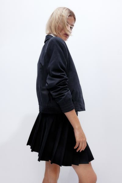 Pleated Mini Skirt - Regular waist - Mini - Gray melange - Ladies | H&M US | H&M (US + CA)