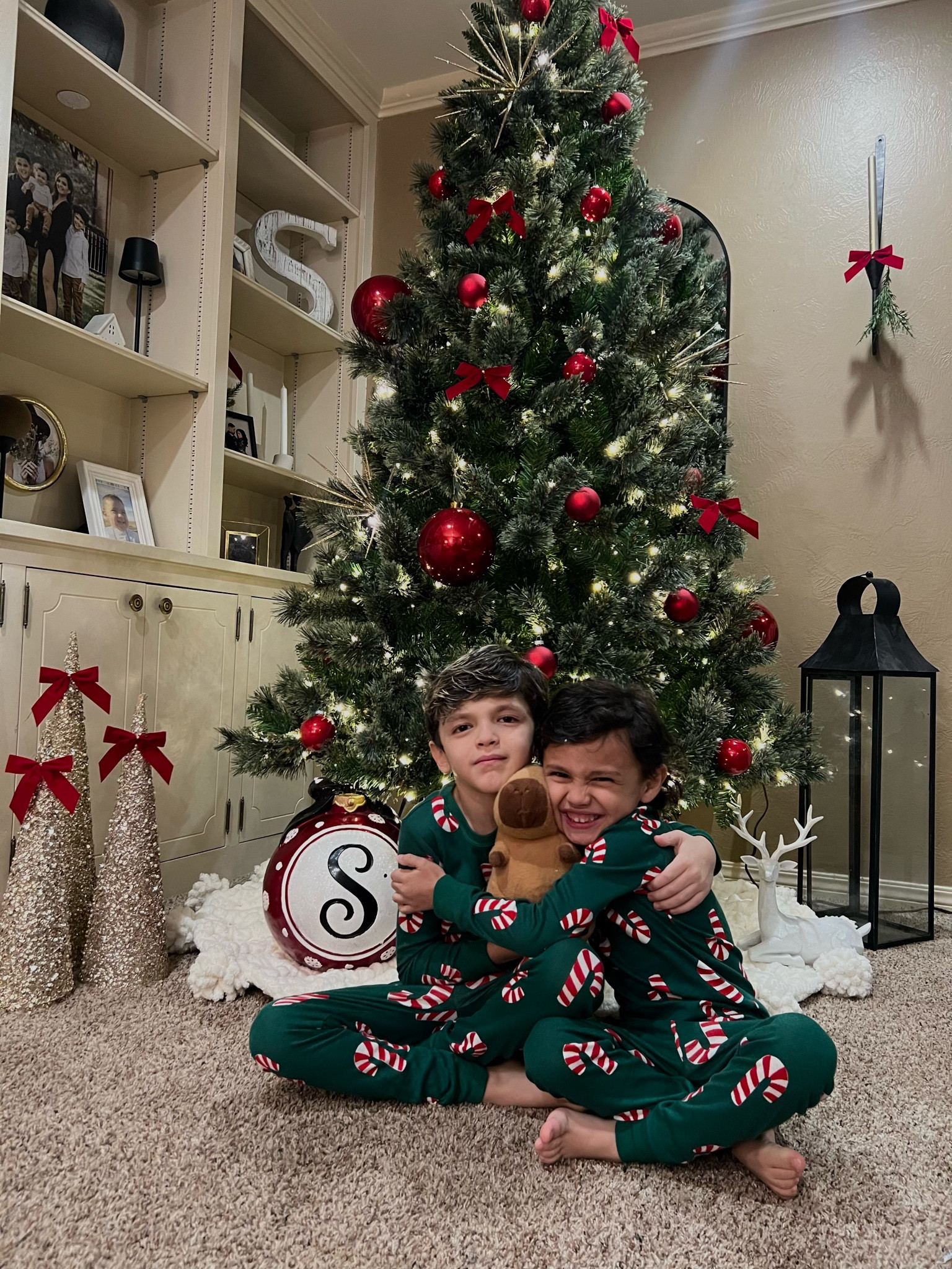 Holiday cheer 
Kids candy cane holiday pjs 🎄

#LTKGiftGuide #LTKSeasonal #LTKHoliday