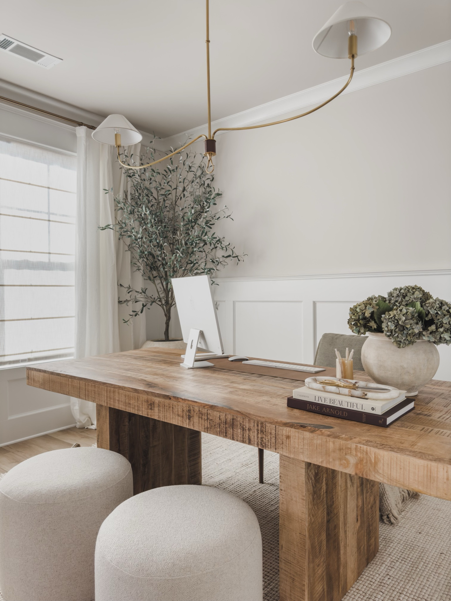 A closer look at my home office space! Leaning into a large dining table for an oversized and elevated desk look while combining creamy whites and hints of green.

Home finds, neutral office, home office vibes, neutral wood tones, furniture favorites, creamy whites, linen curtains, gold detail, faux olive tree, oversized planter, decor book, faux florals, neutral vase, ottoman faves, Pottery Barn style, neutral area rug, catchall tray, desk pad, office chair, Wayfair, found it on Amazon, lighting detail, Lumens, fall refresh, wfh vibes, shop the look!

#LTKSeasonal #LTKHome #LTKStyleTip