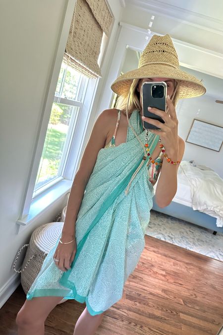 Summer Friday afternoon! Loving the color of this Pareo and wearing this favorite sun hat for the 3rd season in a row. The rope necktie is key on a windy day!

#LTKSeasonal #LTKFindsUnder100 #LTKSwim