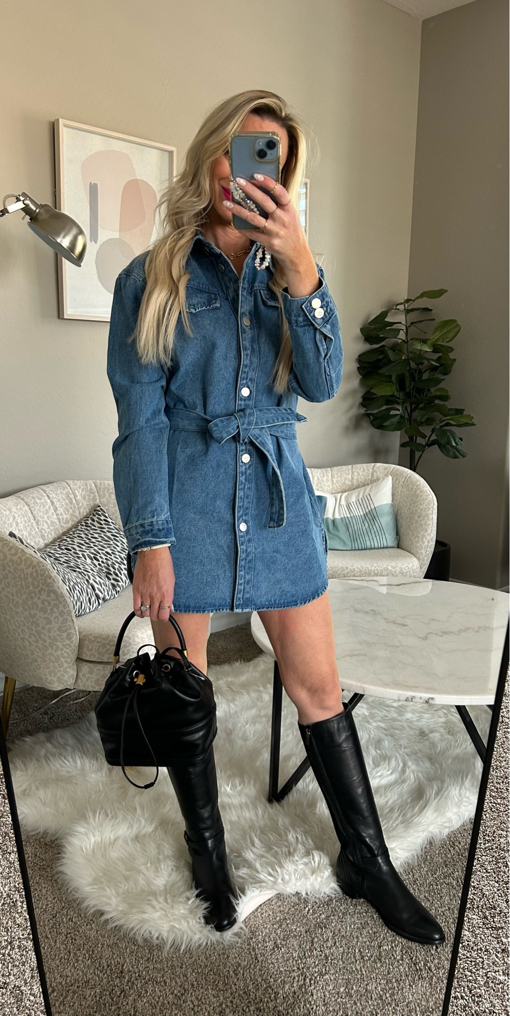 This jean long sleeved dress is the perfect transition dress into spring! Looks great with or without the belt! I styled it here with boots but would also look super cute with sneakers! My bag is sold out but I linked a few similar ones here.

#LTKMostLoved #LTKSeasonal #LTKfindsunder100
