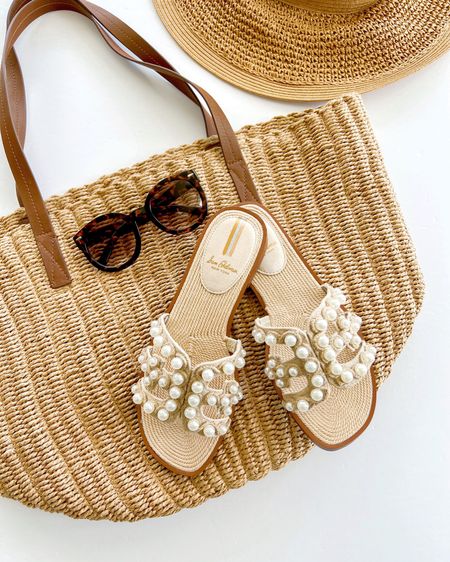 Neutral vacation essentials. New Sam Edelman summer slide sandals 20% off! Love the pearl details! J. Crew straw tote and straw hat also on sale! Amazon fashion sunglasses.

#liketkit @shop.ltk https://liketk.it/44ktd

Spring sandals, spring shoes, spring footwear, summer sandals, summer shoes, summer footwear, shoe wishlist, neutral sandals, neutral slides, versatile neutral sandals, straw tote bag, straw beach bag, straw hat, straw beach hat, beach essentials, vacation essentials, travel essentials, neutral spring accessories, neutral summer accessories, spring summer outfits, pearl sandals, pearl slide sandals, pearl slides

#LTKU #LTKtravel #LTKshoecrush
