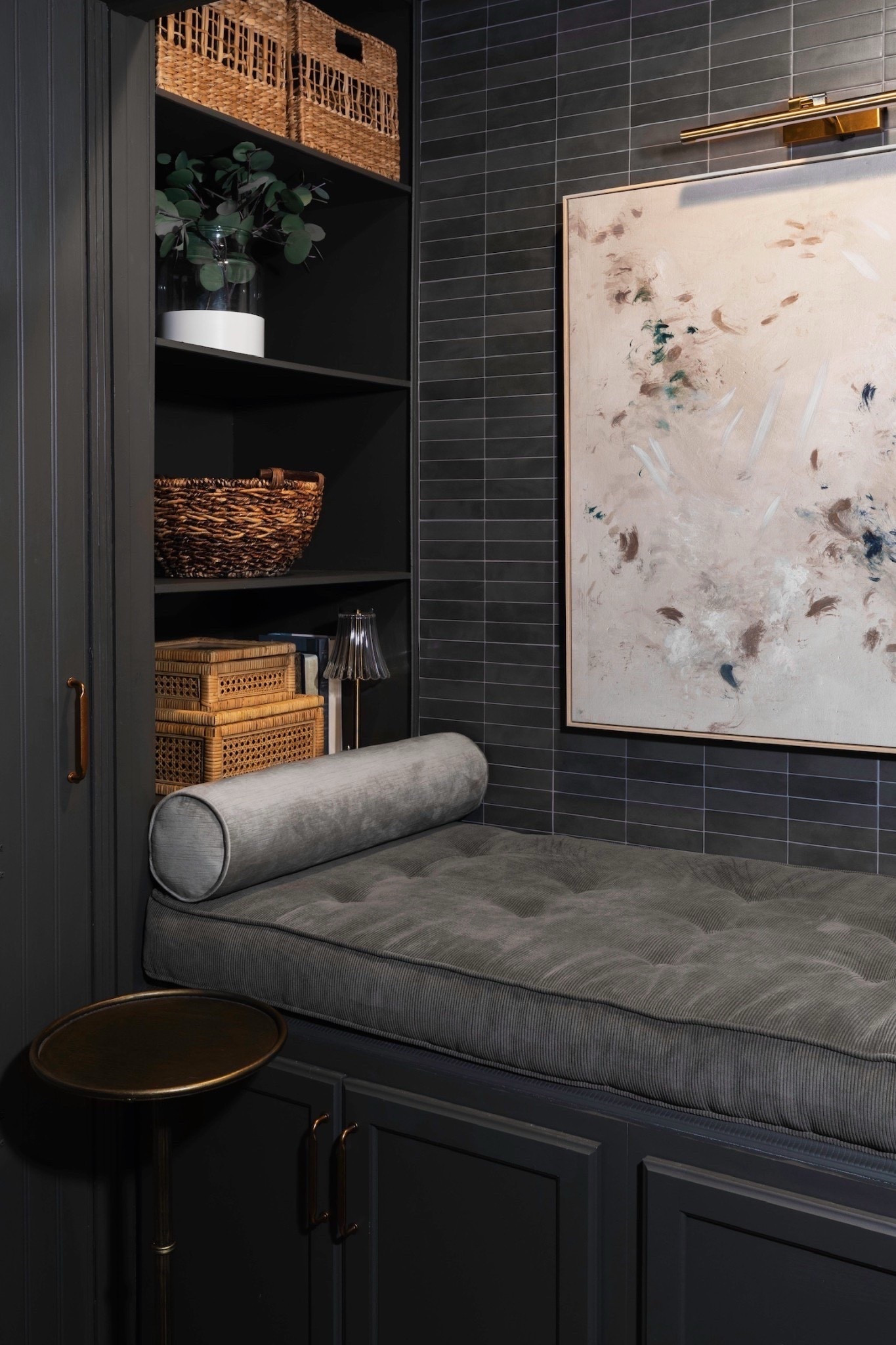 Your new favorite spot to unwind 🌙

We designed this inviting nook with deep gray cabinetry, a plush bench cushion, patterned pillows, and a brass light fixture highlighting a stunning abstract art piece. The subway tile wall and brass side table tie the whole look together for a cozy, elevated retreat.

#builtinnook #darkinteriors #homeinspiration #interiordesignideas #homestyling #cozyspaces #moodydecor #eanesinteriors



#LTKHome #LTKdayinmylife #LTKvlog