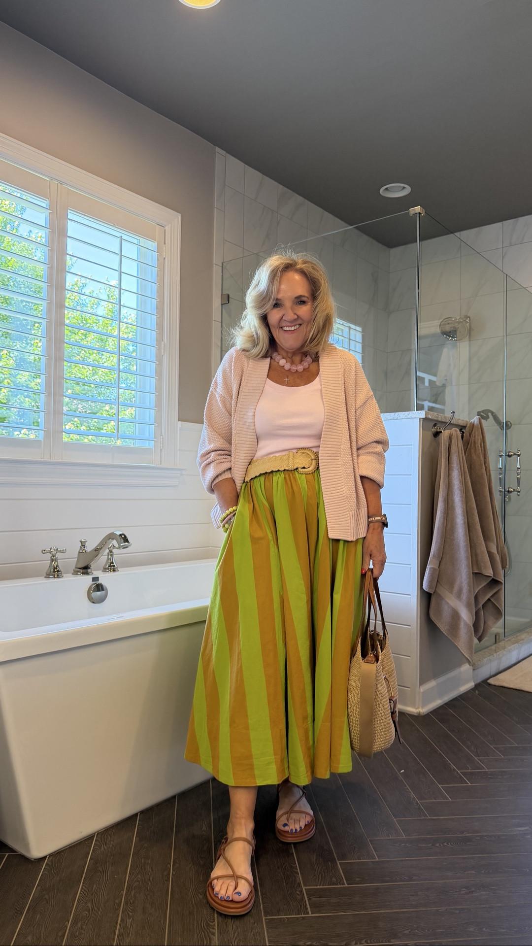 Tank size medium I’ll link the Amazon one too but the free people fabric is so much better 
Skirt size small 
Sweater is lovely I’m in a medium and it is a bit oversized. You decide if you want to size down. Get whatever colors are available. Pink is selling fast! 
20% off my bracelets code NANETTE20
10% off my bag code NANETTE

#LTKMothersDay #LTKSeasonal #LTKOver40
