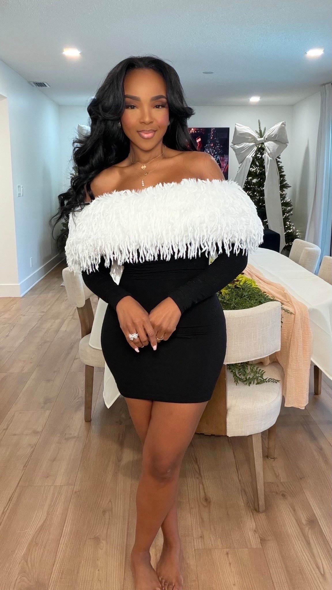 This is one of those statement pieces that instantly elevates your closet — dramatic, flattering, and timeless enough that the cost per wear keeps dropping with every occasion.

The off-the-shoulder neckline paired with feather detailing creates that bold, luxe moment, while the fitted black silhouette keeps everything balanced and wearable. It’s the kind of dress that does all the work for you.

Perfect for holiday parties, cocktail events, date nights, birthdays, or any night you want to feel unforgettable.

📏 Sizing & Fit Details  
Height: 5'4"  
Weight: 138 lbs  
Bust: 34D  
Waist: 27"  
Hips: 40"  

Wearing Size Small  

Save this post for later and shop this look when you’re ready.

Feather trim dress, off the shoulder mini dress, black cocktail dress, holiday party outfit, bold evening look, statement dress styling, cost per wear fashion

Follow me on Instagram and YouTube @kirasfashionfinds 

#LTKPetite #LTKootd