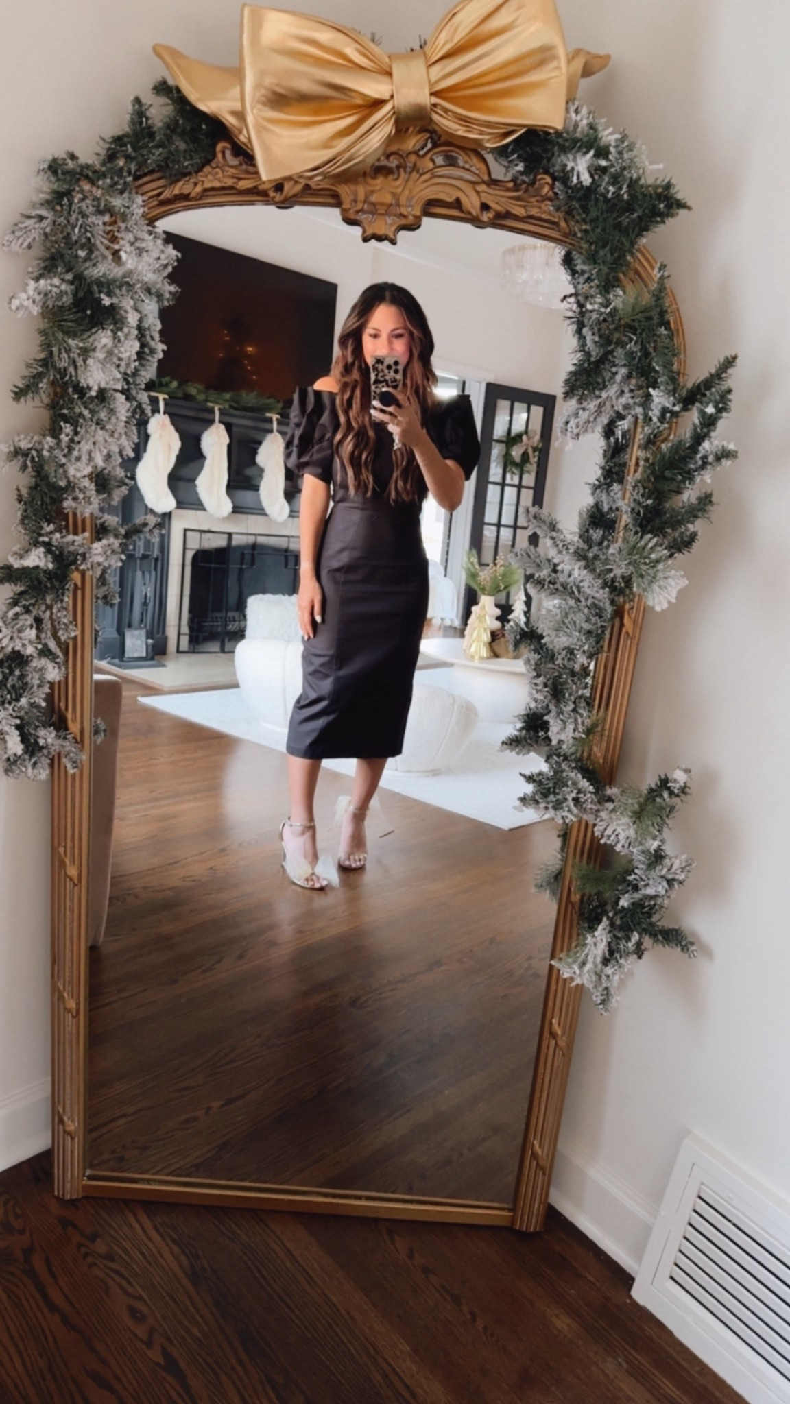 Black off shoulder dress and bow heels 


#LTKHoliday #LTKGiftGuide