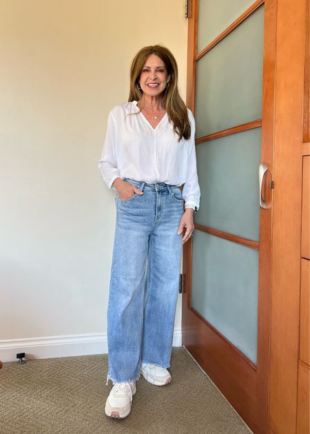 These wide leg jeans with the frayed hem are some of my favorites this spring! They’re a little stretchy. I wear size 25. Fit pretty tts. Paired with an older white split neck top and sneakers for a day of shopping.
#casualoutfit #onthegolook #capsulewardrobe #womeover50

#LTKStyleTip #LTKShoeCrush #LTKSeasonal