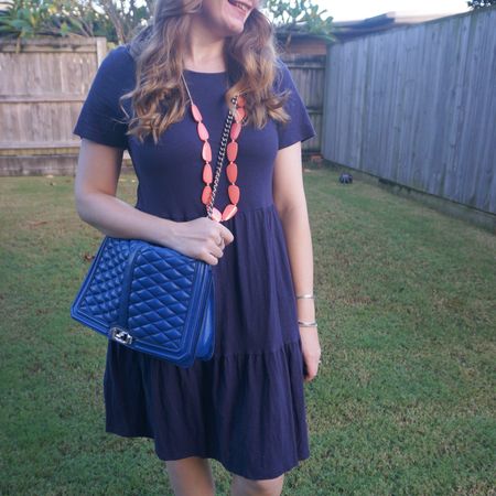 Navy tiered Kmart dress with my cobalt jumbo Rebecca Minkoff Love bag and a pop of orange from my necklace 💙

#LTKaustralia #LTKitbag