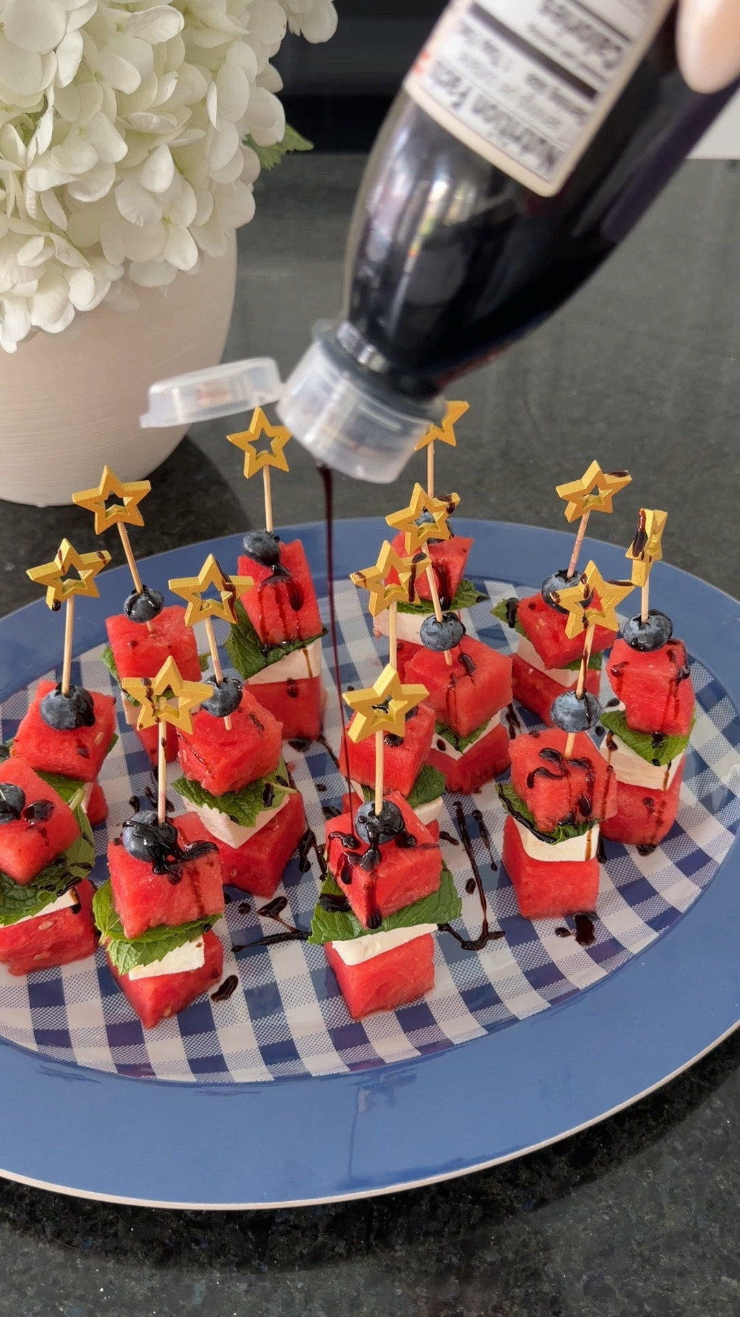 Watermelon feta skewers 🫐🍉⭐️ light healthy 4th of July appetizer or side

You need:
mini seedless watermelon, cubed
block of feta cheese, cubed
mint leaves
blueberries
balsamic glaze

#LTKfoodie #LTKSeasonal