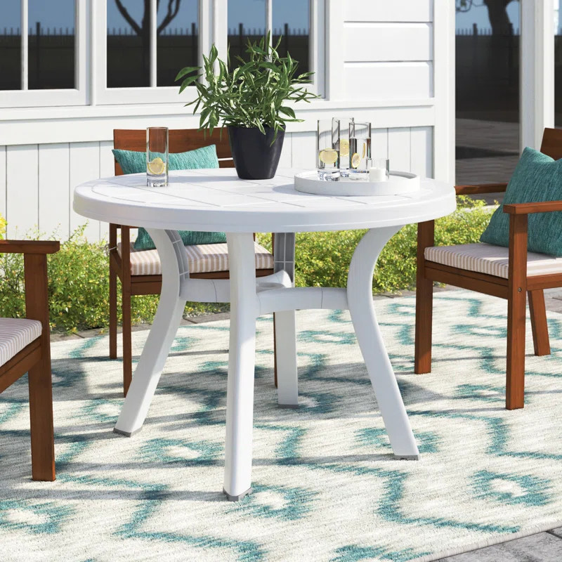 Makena 29'' H Round Outdoor Dining Table with Umbrella Hole | Wayfair North America