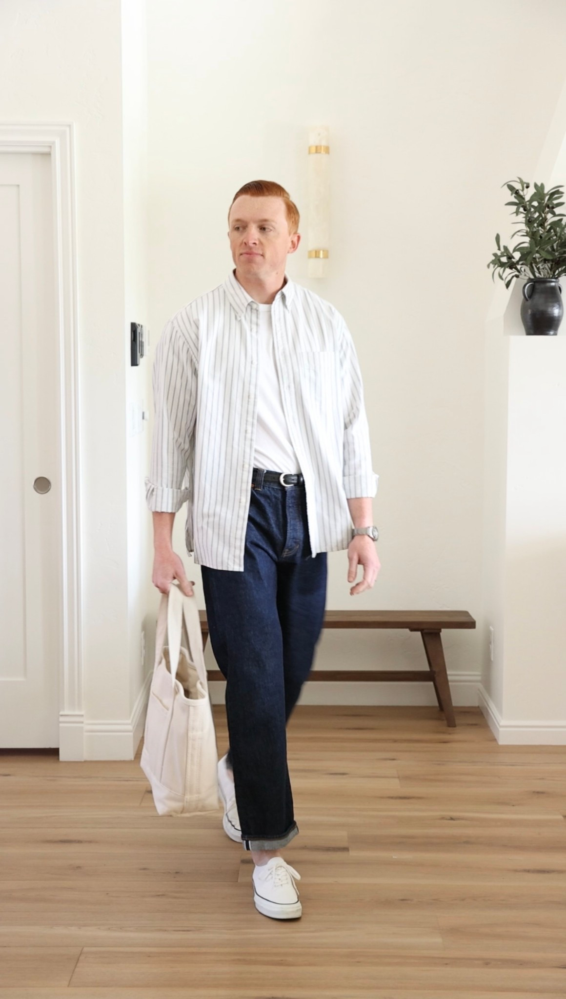 Casual spring outfit with a striped Oxford shirt and dark washed jeans.

#LTKMens