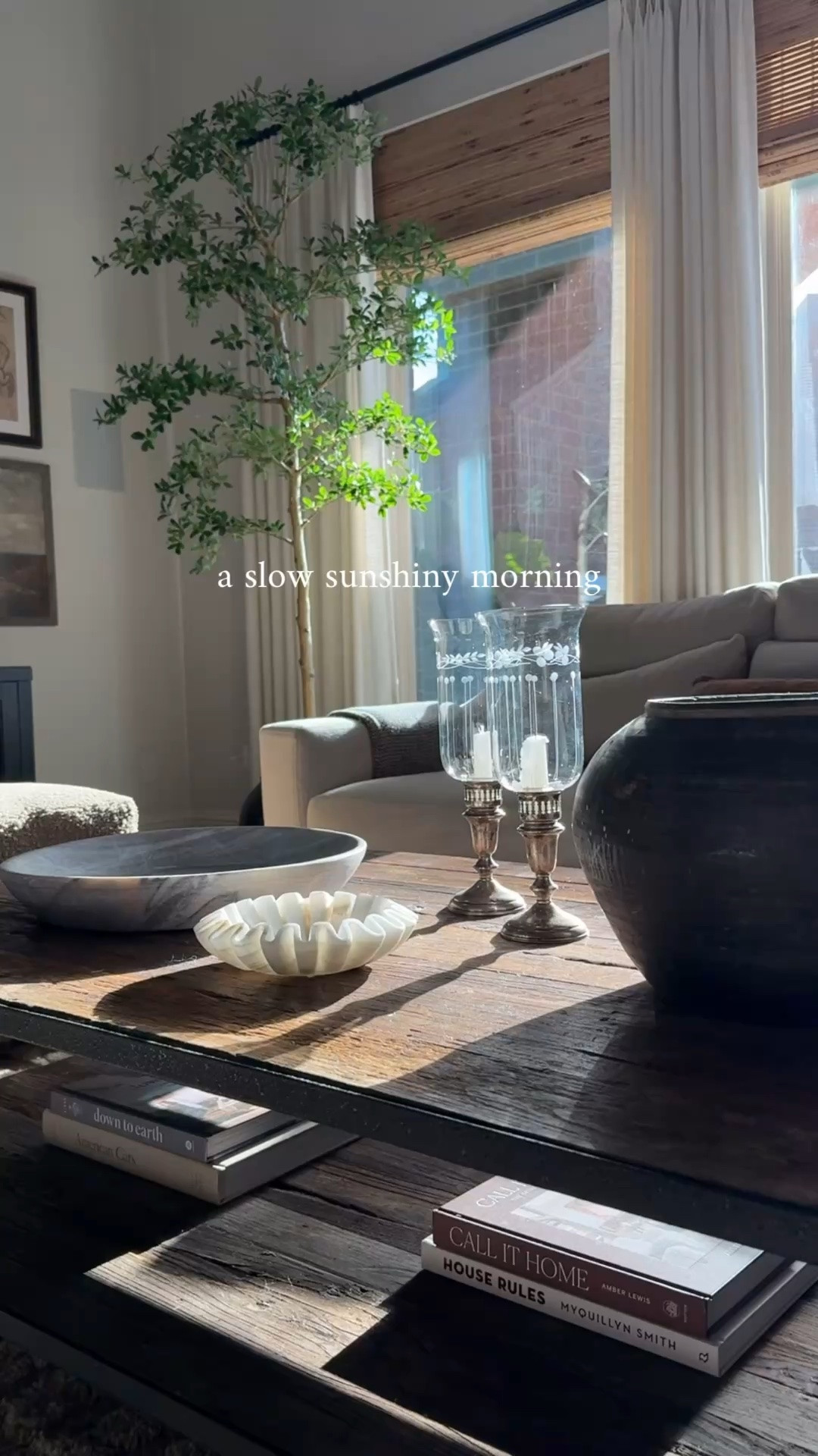 Neutral layered living room mixing new and vintage

Faux black olive shady lady tree, cream slipcovered sofa, grey rolled arm chairs, washable textured rug, boucle DIY ottoman stools, linen drapes, bamboo blinds

#LTKHome