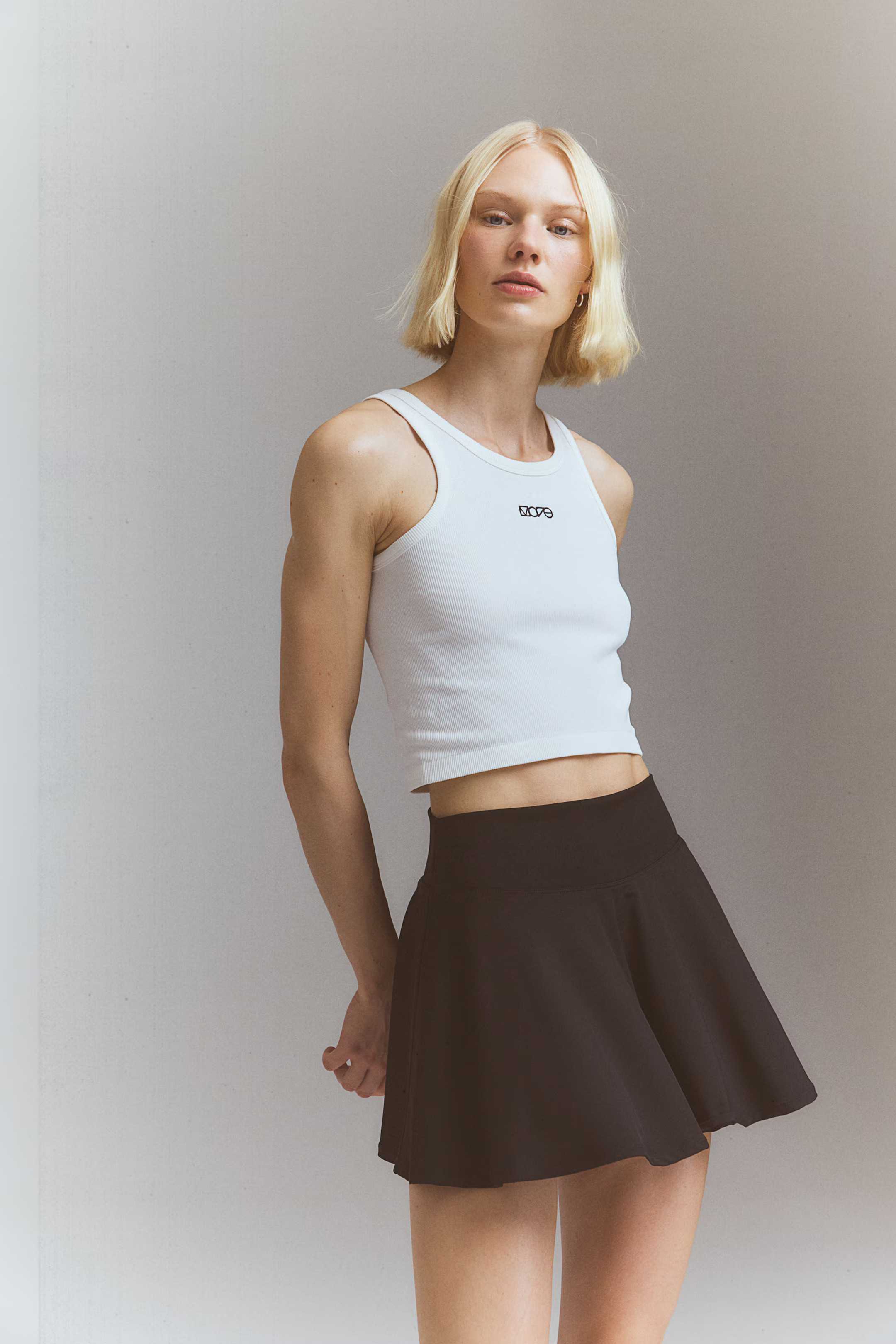 DryMove™ Circle-cut tennis skirt - High waist - Mini - Black - Ladies | H&M GB | H&M (UK, MY, IN, SG, PH, TW, HK)
