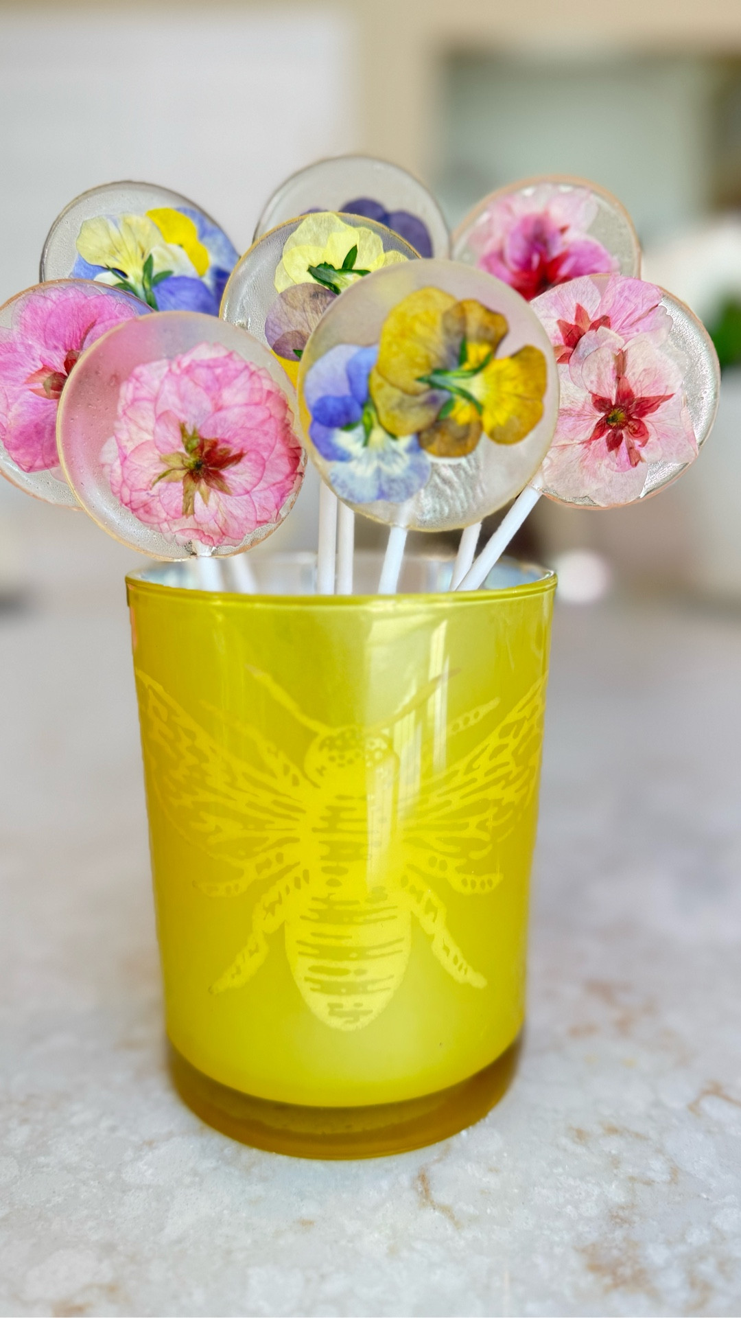 These edible flower lollipops are a stunning way to bring nature’s beauty into a sweet treat. 🌸 Made with crystal-clear sugar candy and delicate pressed blooms, they’re perfect for gifting, party favors, or a floral-themed celebration. Almost too pretty to eat—but too delicious not to! 🍬🌼

#EdibleFlowerLollipops #DIYCandy #PressedFlowerTreats #SpringSweets #GardenPartyIdeas #HandmadeWithLove #CandyArt #LollipopLove #PrettyAndTasty #JustJennsDesign #SugarCraft #EdibleFlowers #SpringDIY #FloralCandy #FlowerPowerTreats #FoodieFavorites #Instagood #SweetToothStyle

#LTKSeasonal #LTKParties