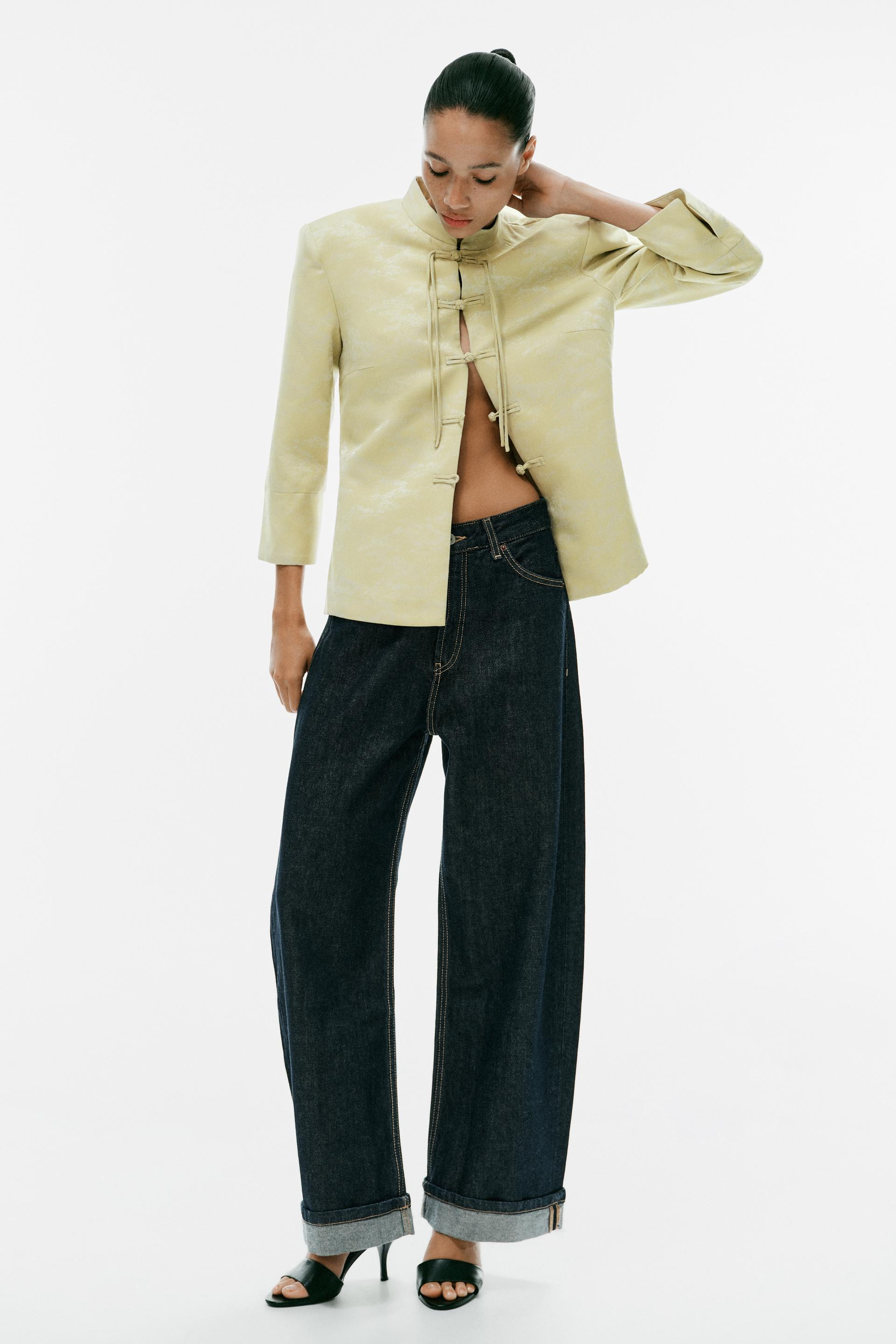 Mittelhoher Bund - Baggy-Jeans mit Umschlag. Jeans mit mittelhohem Bund und f\u00fcnf Taschen. Sa... | Zara DE