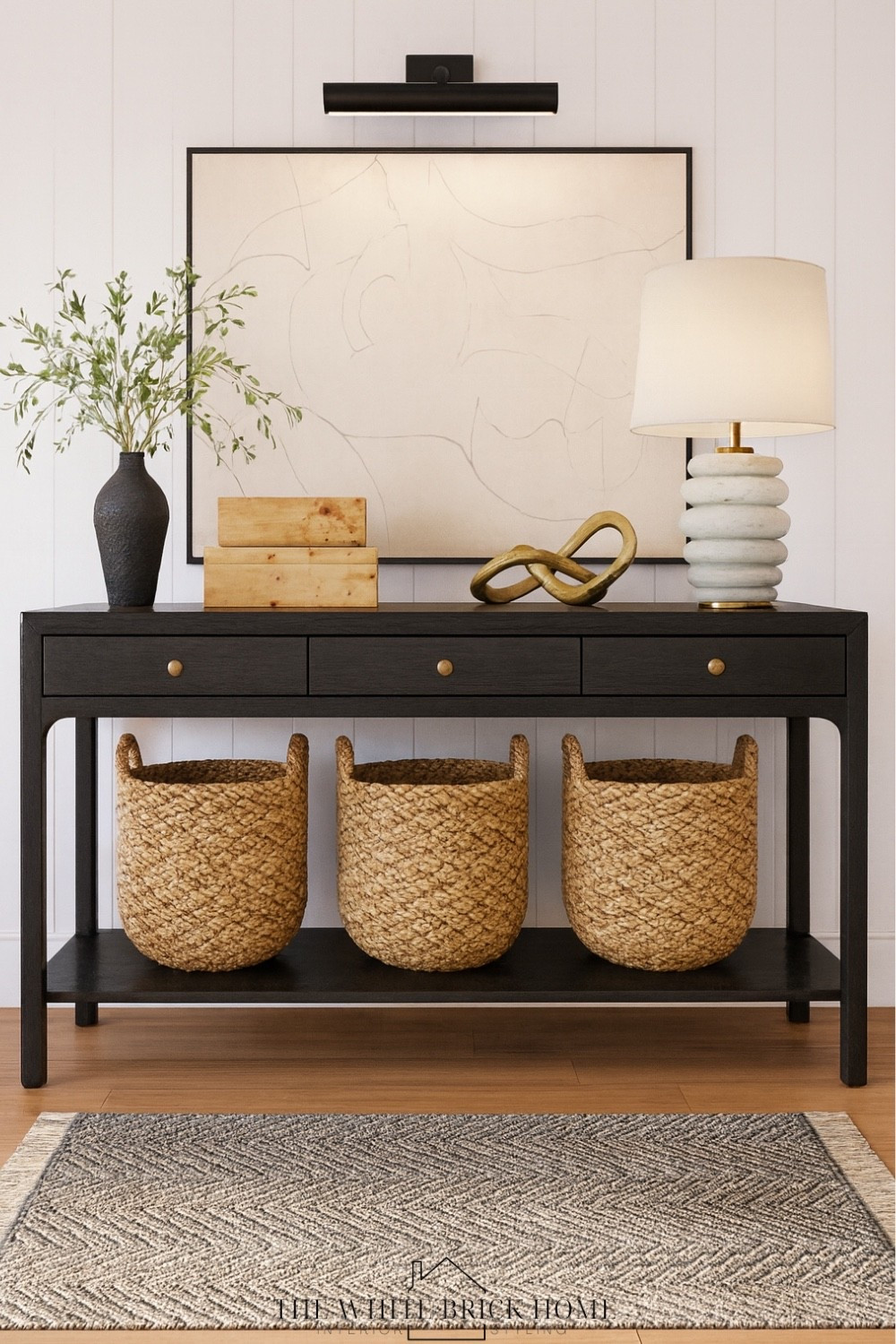 This entryway design blends timeless black accents with natural textures and accent living, creating a balanced and inviting first impression. 

Console table, buffet table, table lamp, lamp, picture light, home decor, home design, basket, home entryway, console table styling, coffee table, coffee table decor, vase, area rug, entryway rug, foyer decor, wall art, modern home, modern home decor, pottery barn, Wayfair, McGee and co, Amazon 

#LTKHome #LTKSeasonal #LTKFindsUnder100