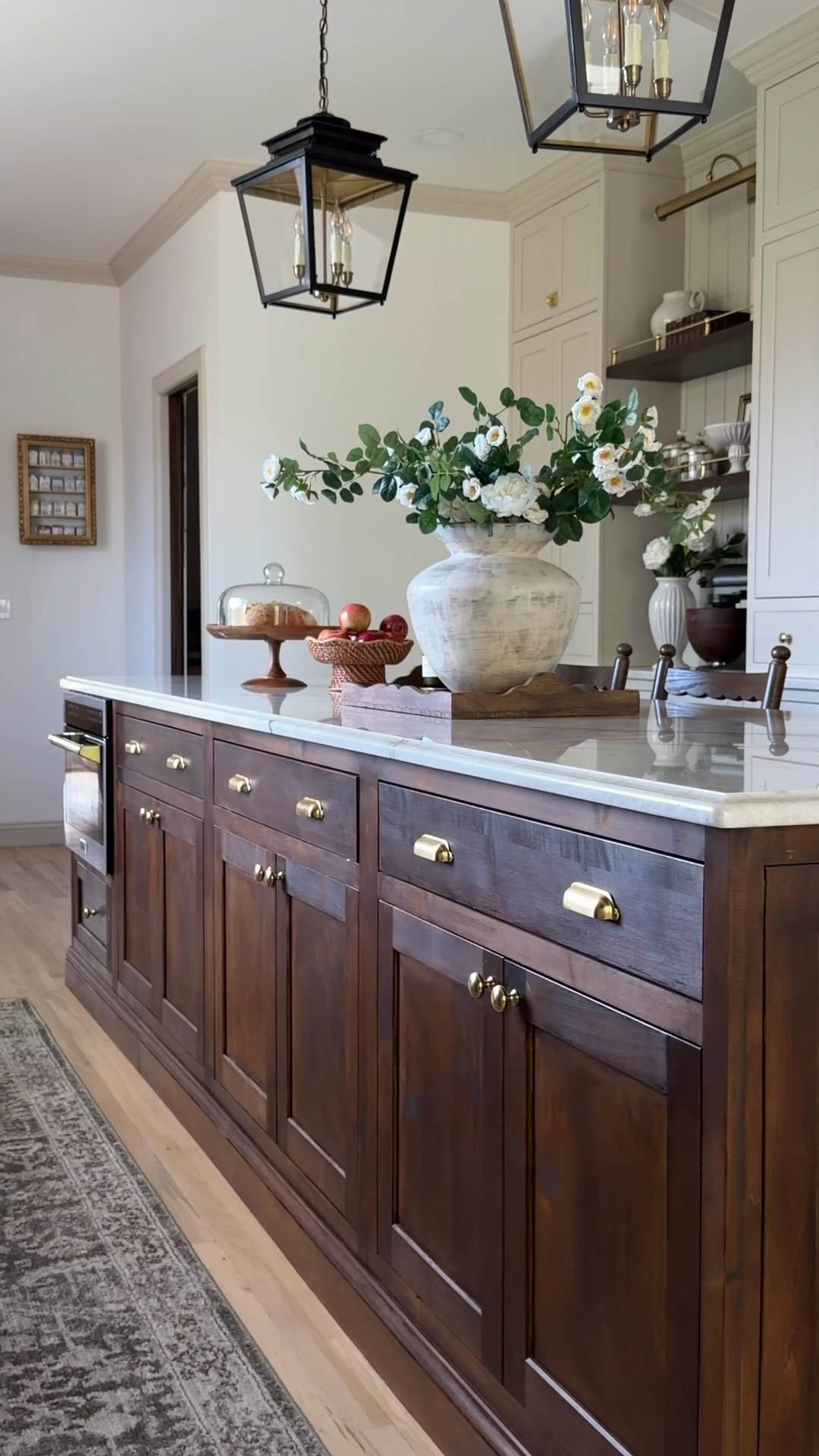 Hardware is the jewelry of your kitchen cabinets!! Ours are color Aged Brass

