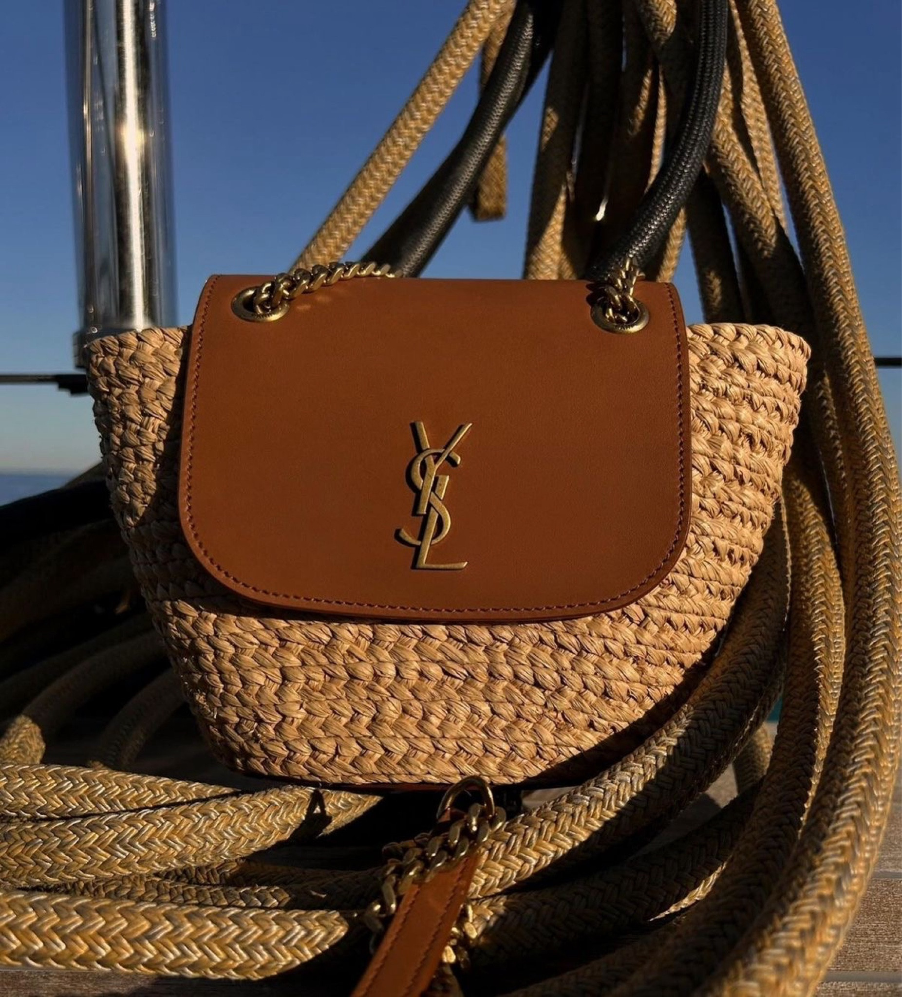 The timeless elegance with the YSL woven straw bag. Perfectly blending luxury with a laid-back vibe, this chic accessory is your ultimate companion for beach getaways, brunches, and everything in between. The rich leather accents and iconic YSL logo make it a must-have for fashion lovers. Don’t miss out on this perfect blend of sophistication and summer flair. 🌞👜 #YSL #SummerEssential #LuxuryFashion

#LTKTravel #LTKItBag #LTKStyleTip