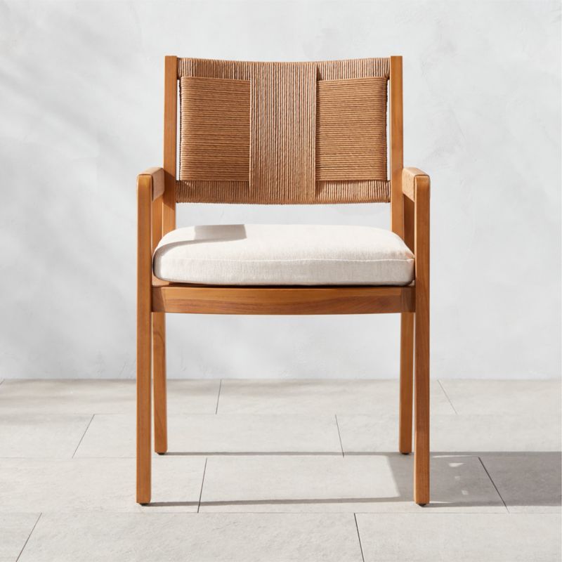 Roc Teak and Rattan Outdoor Dining Armchair with Ivory Sunbrella Cushion by Ross Cassidy + Review... | CB2