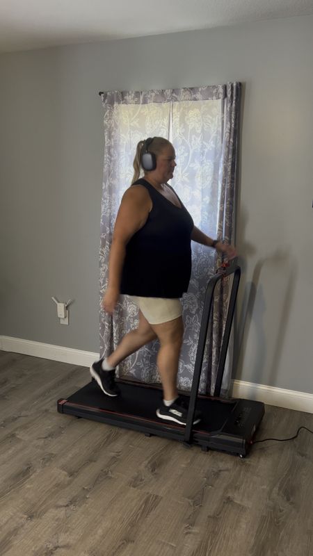 We wanted some for our house that we could use to get our steps in on hot days, rainy days, cold weather, etc. I did lots of research and we landed on this walking pad. We needed it to handle larger bodies / weight and be able to easily stored. This can be tucked under a bed, off to the side of a room, or even leaning up against the wall. It is great! 

Walking pad | at home gym | walking | workout | Amazon find 

#LTKcurves #LTKFitness #LTKhome