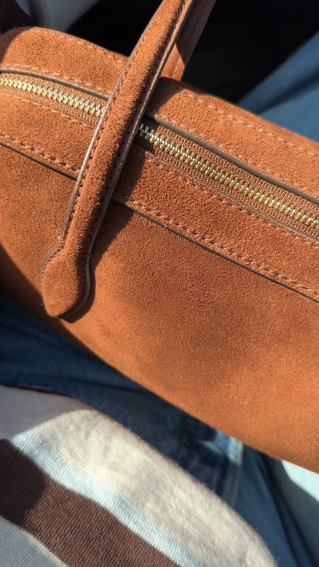 Classic Fall outfit: striped polo & jeans. 
- This exact polo is a sweater done in merino wool. Feels luxe and can be worn alone or layered. I sized up for a relaxed fit. It has been a popular one and has been restocking periodically  
- Straight leg 90s jeans always work. I size up in my favorite true 100% cotton denim style. 
- Suede handbag. Trying out a non crossbody style to change things up and this one is easy to carry on the shoulder or arm. 
- Suede flats in chocolate brown. Linking a variety of options for the look. 
- Classic everyday gold necklaces and cuff bracelet. 


#LTKItBag #LTKFindsUnder100 #LTKOver40