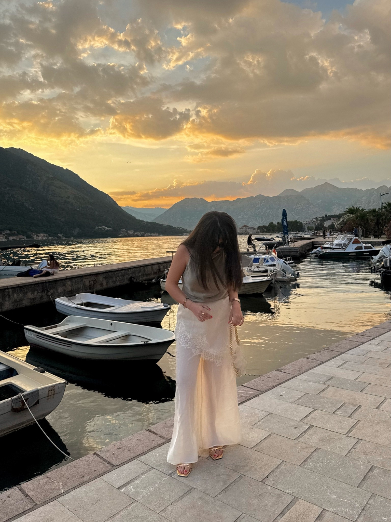Golden hour called for this look. ✨🤍 The draped halter top, sheer lace-trim scarf pants, and shell bag made the perfect outfit for a waterfront dinner. It’s equal parts elevated and effortless—exactly what I want to pack for a summer vacation. Linking everything I can! 🌅🐚

#LTKSeasonal #LTKootd #LTKTravel