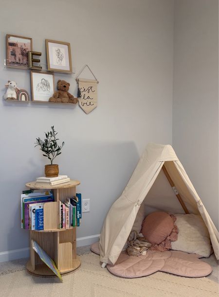 Toddler reading book with rotating bookcase!