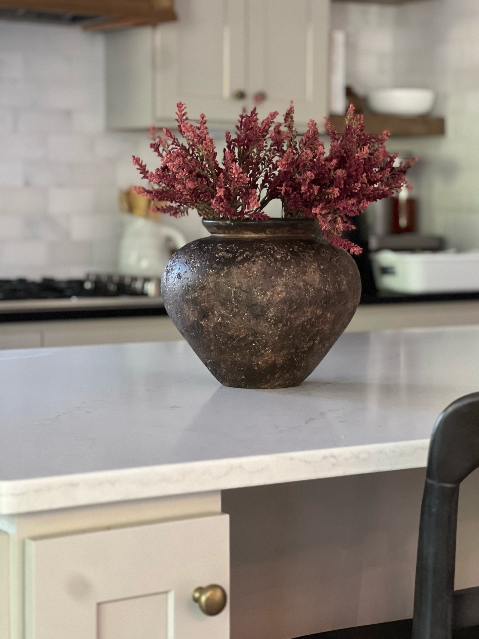 Fall florals and distressed Teracotta vase 

#LTKHome #LTKSeasonal #LTKFindsUnder50