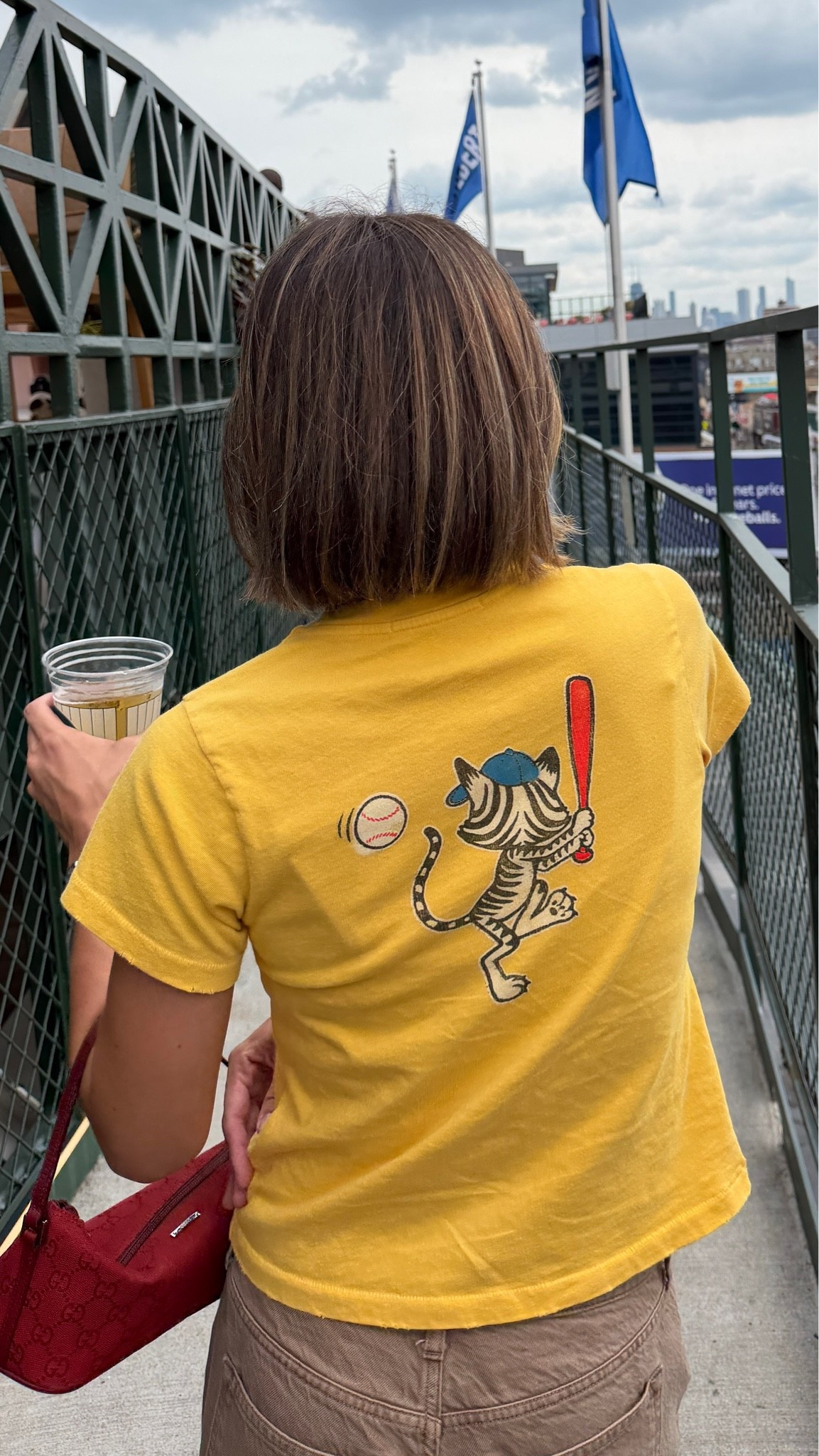 Wore to baseball game! Small tee, 24 short jeans. Bag is vintage