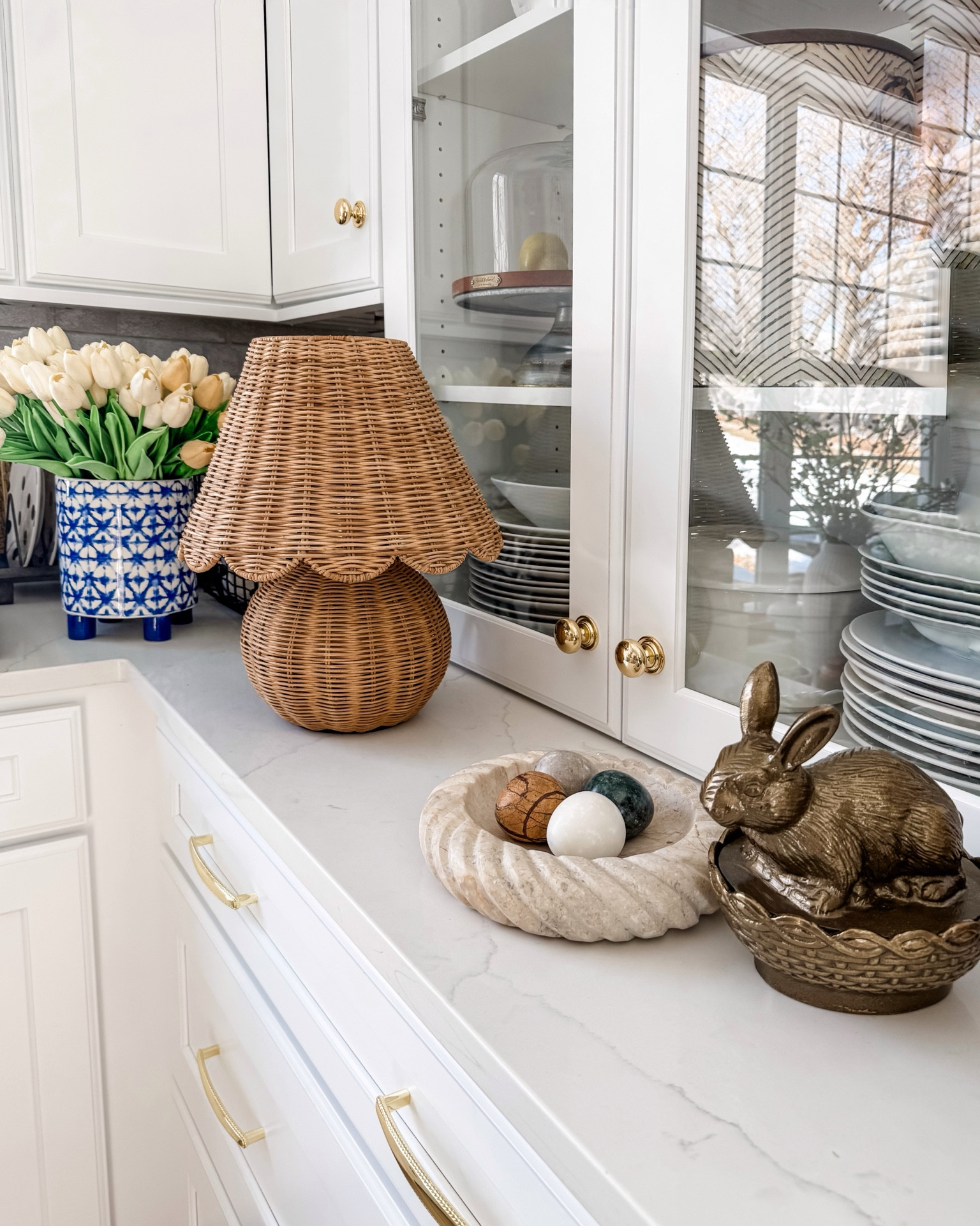 Pretty Spring details on my kitchen counter. Darling lamp, rabbit candy dish, marble eggs, marble dish, flowers and more.  Enjoy! #target #walmart #amazon #studiomcgee #spring #springdecor #easter #easterdecor #styledtray #traystyling #traydecor #mytargetstyle #cornerofmyhome #aesthetic #interiordecorating #transitionalhome #kitchenreel #boujeeonabudget #kitchendecor #kitchensofinstagram #amazon #counterdecor #amazonmusthaves #openshelves #springdecor #springstyling #springrefresh #kitchensofinstagram #mypotterybarn #easterdecor #springflowers #springiscoming #springblooms #eastertime #easterbunny
Spring Tray | Tray Styling | Easter Decor | Flameless Candles | Interior Decorating I Amazon Home | Amazon Home Finds | Home Decor | Easter Tray | Spring Centerpiece | Easter Centerpiece | Target Decor |
Easter Bunny | Spring Home Decor | Kitchen Centerpiece | Spring Vignette | Grand Millenial | Southern Charm | Bows | Target Home 

#LTKWatchNow #LTKHome #LTKSeasonal
