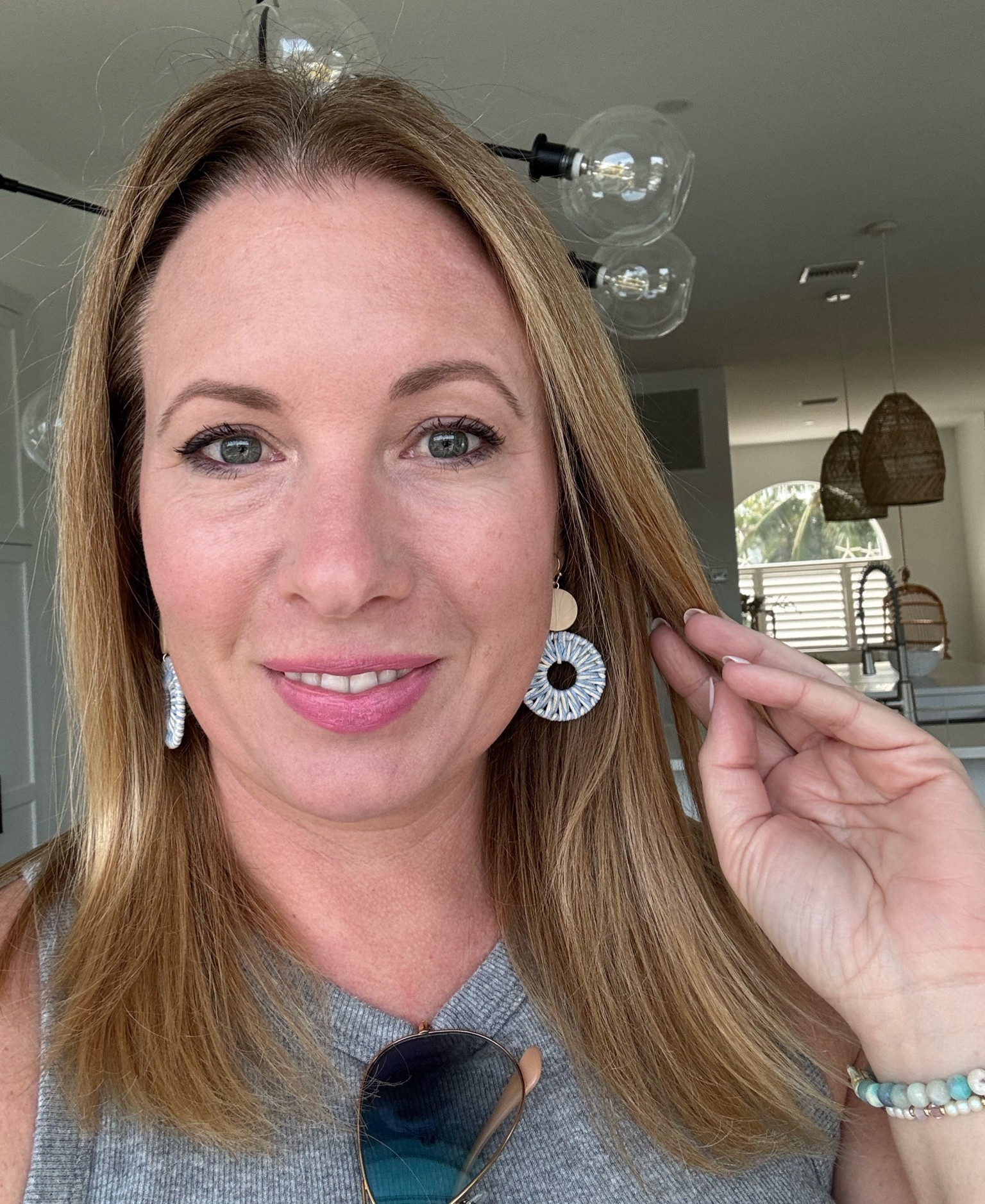 Blue boho earrings. Just got these and they are so light weight and perfect for spring. I got the beige  pair too! #hocsummer 

#LTKfindsunder50 #LTKSeasonal #LTKstyletip