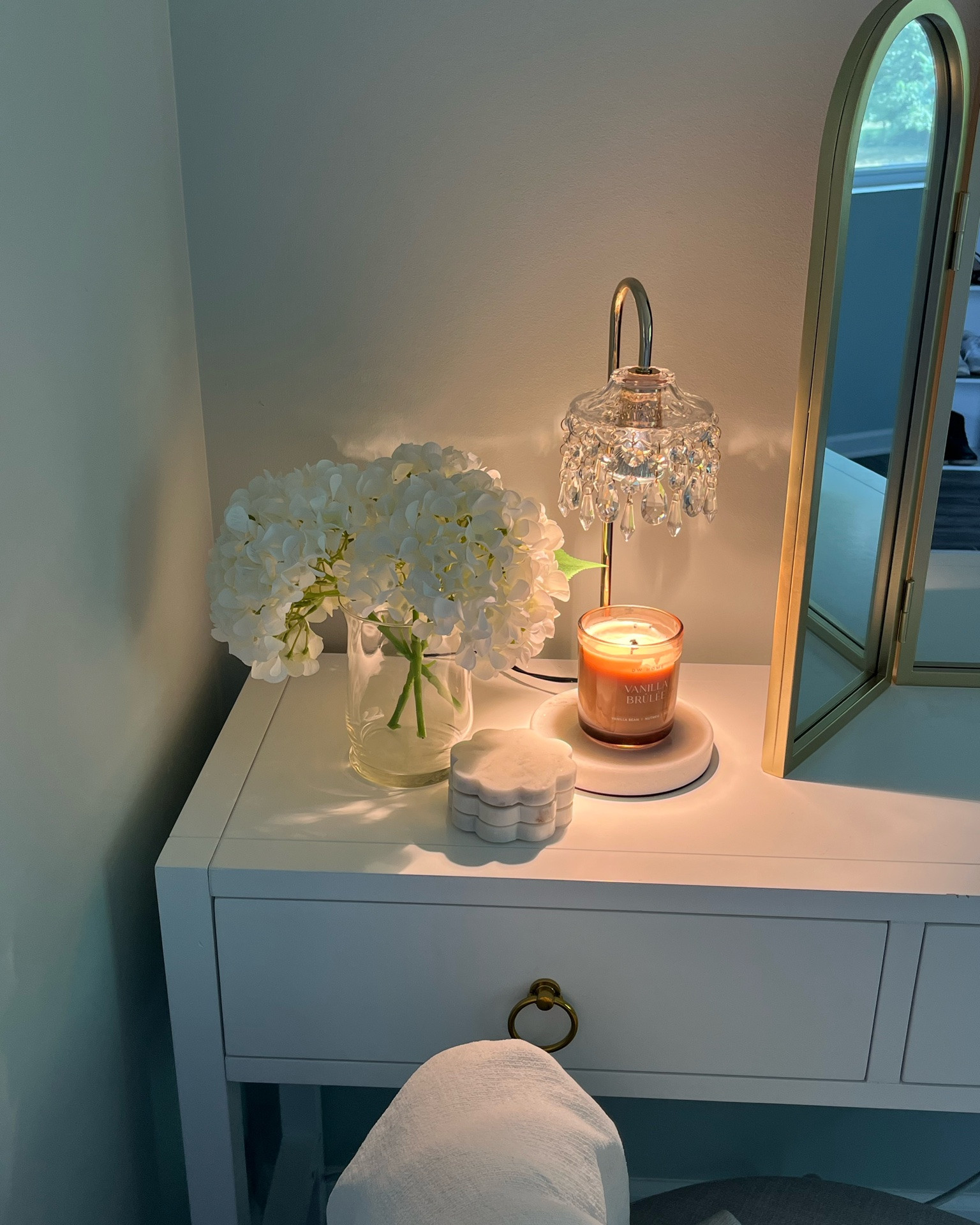 My new chandelier candle warmer 🕯️ Absolutely in love with how this looks in my office on my vanity! I wanted a small lamp to go here to offer some more light, but this candle warmer lamp is actually perfect! 🤍

Chandelier, lamp, home decor, chic classic home decor, lights, candle warmer, crystal, vanity, makeup vanity decor, amazon home

#LTKHome