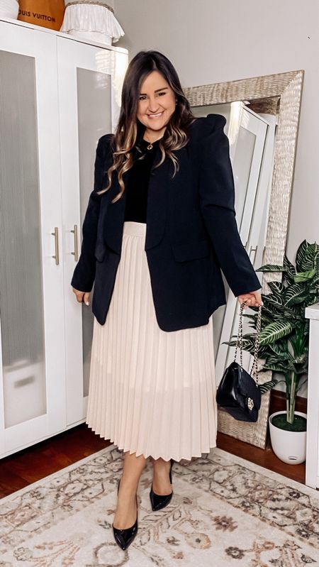 Wearing an xl blazer
Wearing an L pleated skirt
Wearing an L in tank top
Black pumps tts

Work outfit, black blazer, oversized blazer, pleated skirt, black heels, amazon style 

#LTKunder50 #LTKworkwear #LTKcurves