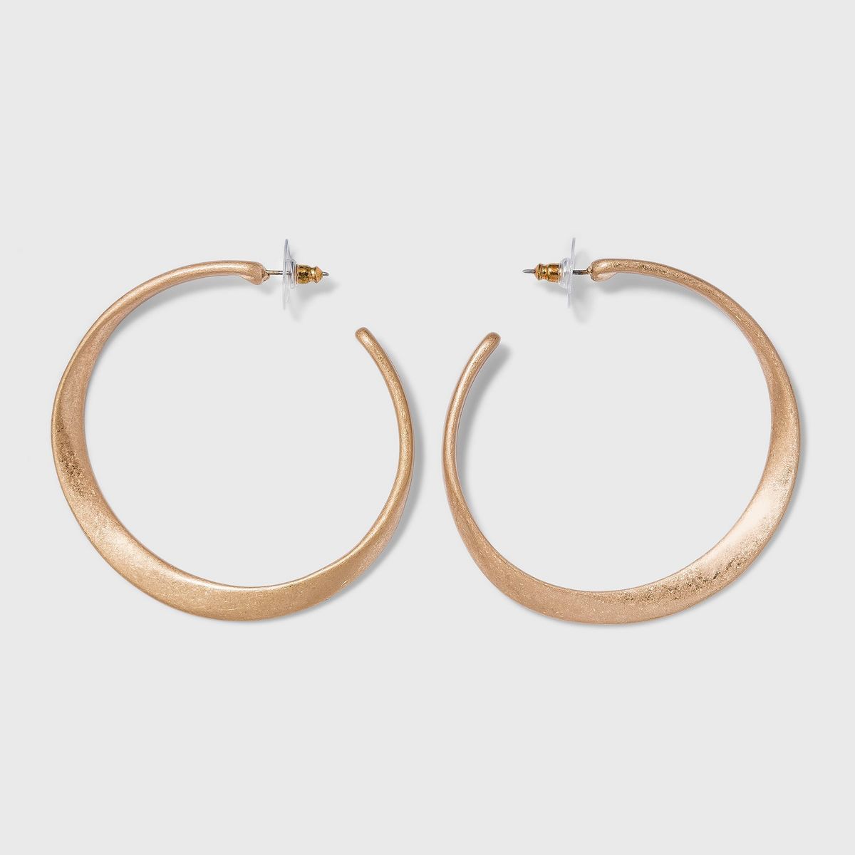 Sculpted Worn Gold Post Hoop Earrings - Universal Thread™ Gold | Target