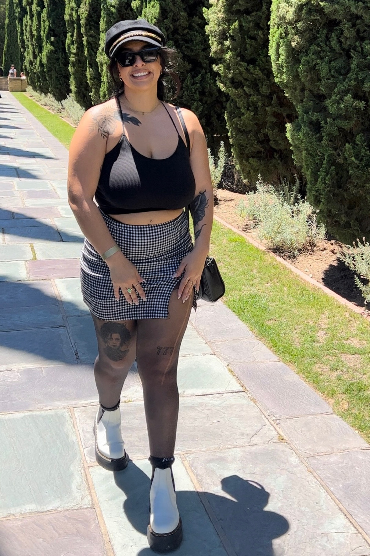 Saturday summer fit 
Crop clack top w/ black & white skirt sheer tights and white docs, paper not hat with chain, Steve Madden purse 

#LTKsalealert #LTKtravel #LTKSeasonal