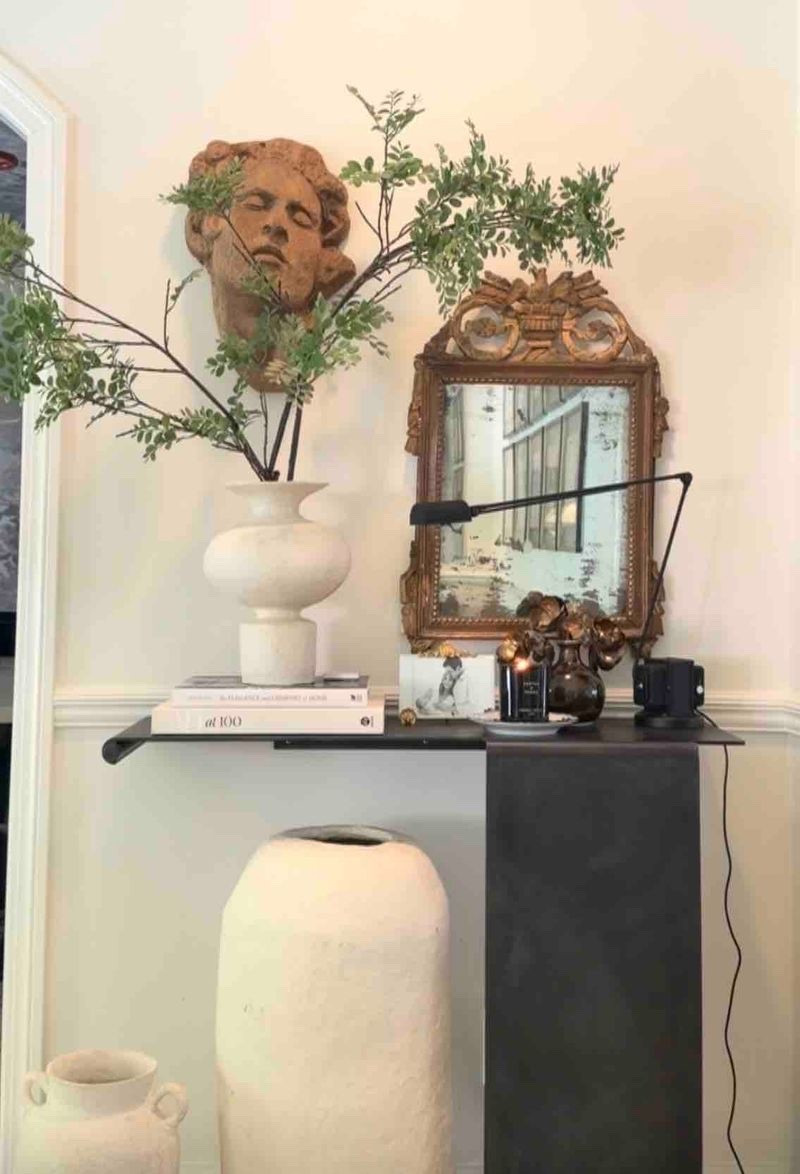 always collecting🖤 old, new, sentimental (like my grandmother’s picture frame) & a few weird little treasures. I love when a space feels collected over time instead of perfectly “decorated”.

my foolproof console styling formula 👉🏼 book stack + something green + lamp + family photo + candle

I linked everything I could and found some really cool alternatives for the antique & one-of-a-kind pieces I’ve collected over the years.

#LTKSeasonal #LTKHome #LTKdayinmylife